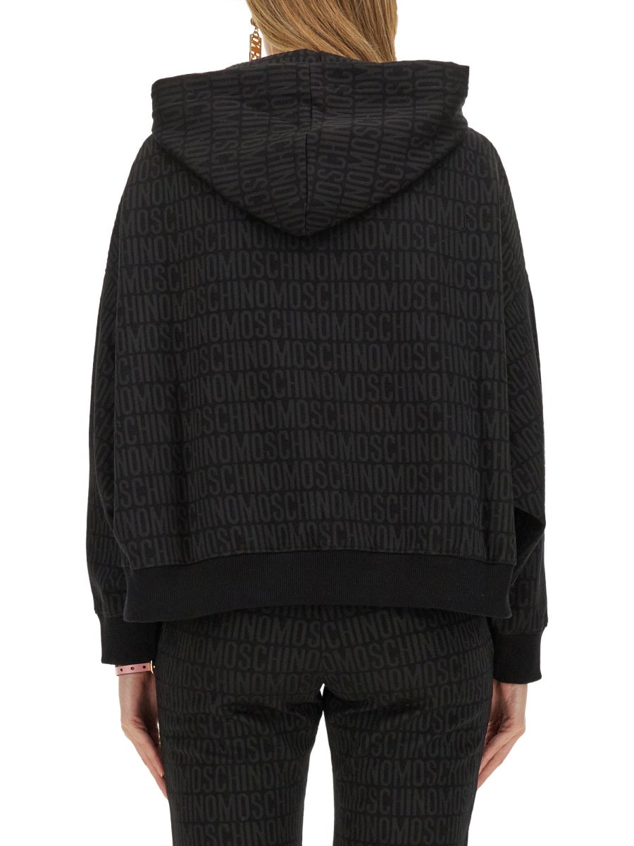 MOSCHINO COUTURE All-Over Logo Sweatshirt - Size S