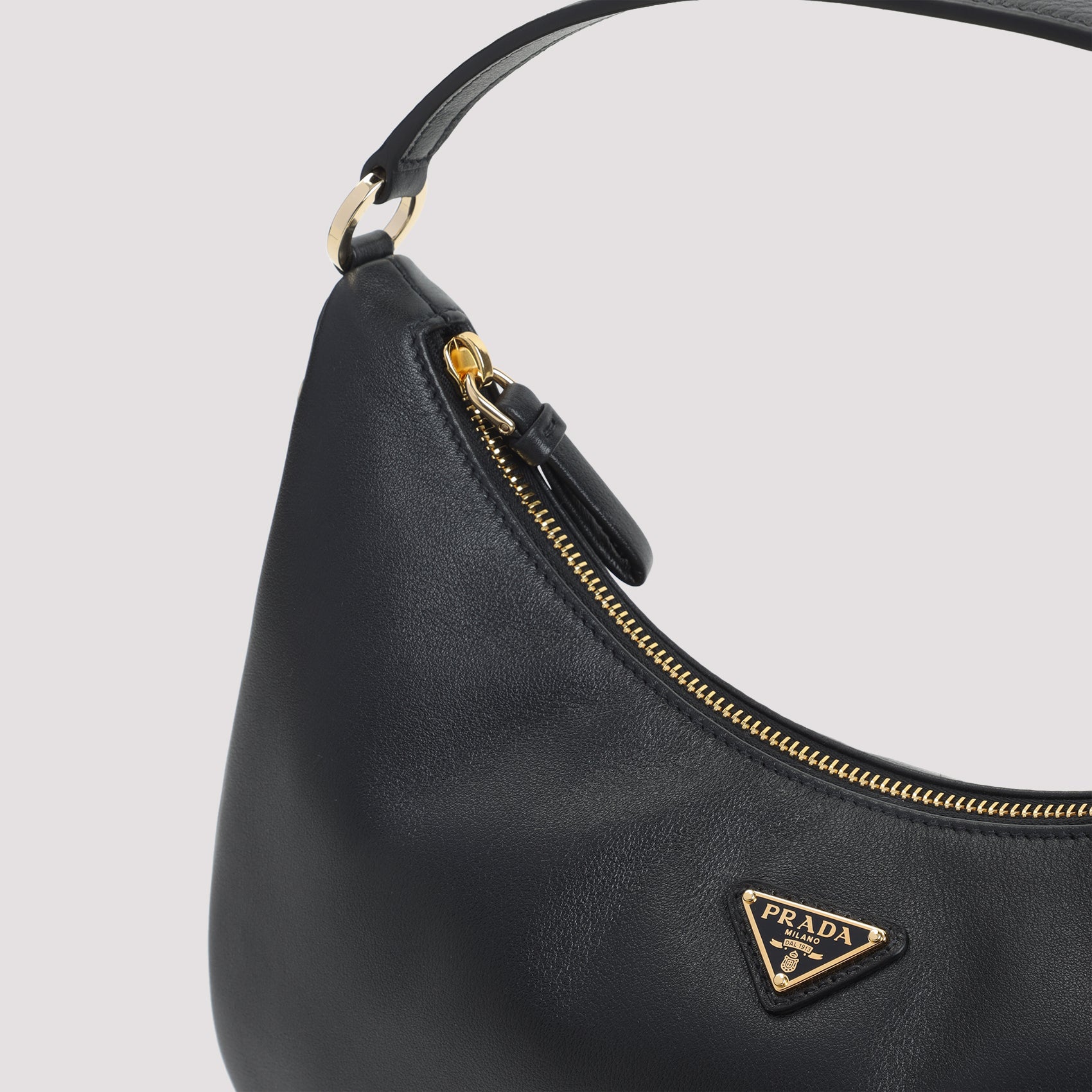 PRADA Mini Leather Handbag with Tonal Handle and Adjustable Strap