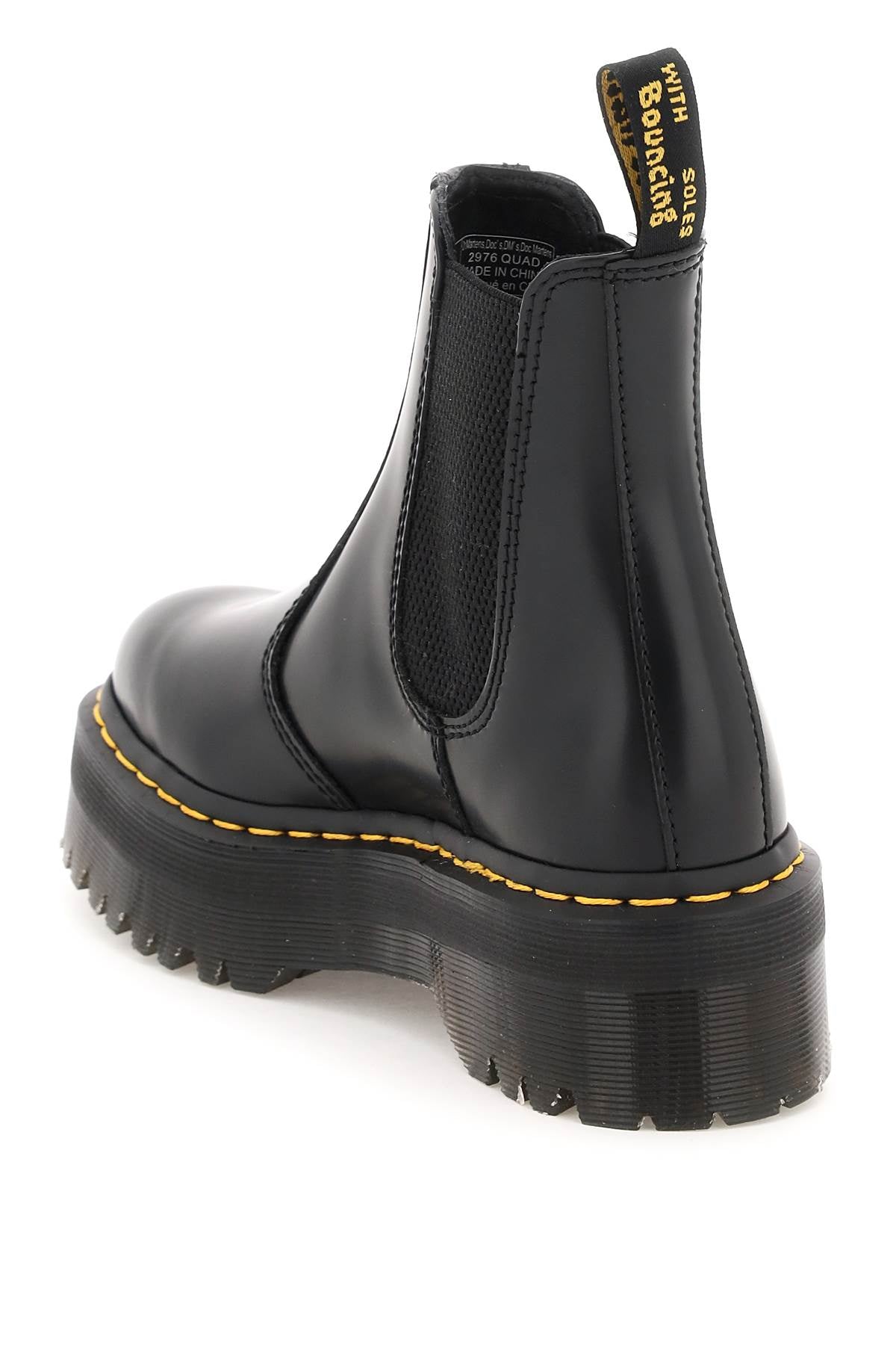DR. MARTENS Chunky Platform Slip-On Quad Boots