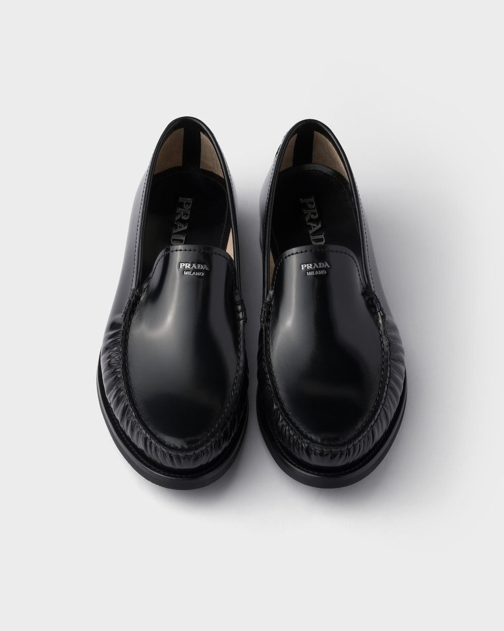 PRADA Brushed Leather Loafers for Men - Fall/Winter 2025