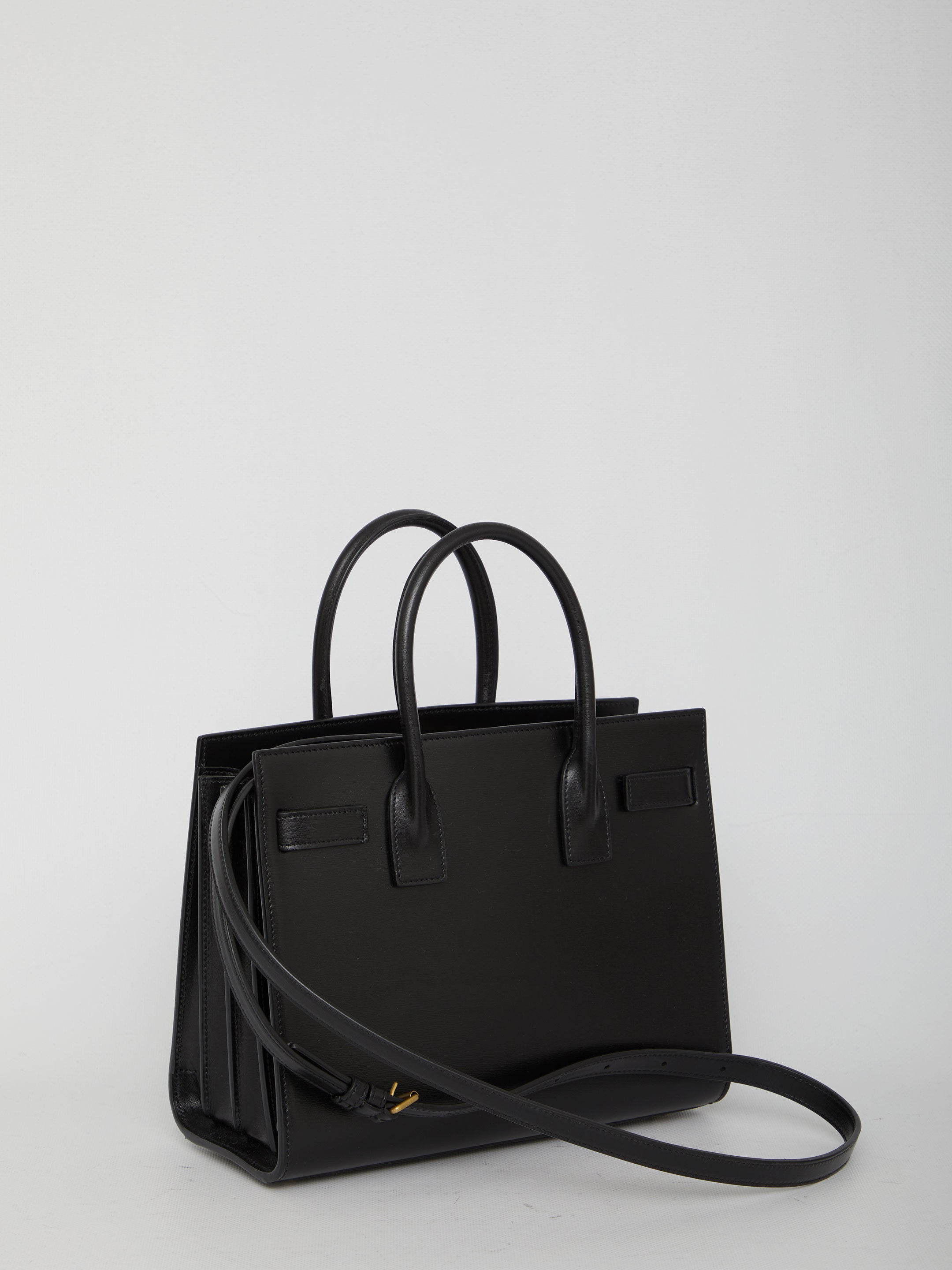 SAINT LAURENT Elegant Smooth Leather Handbag with Adjustable Shoulder Strap