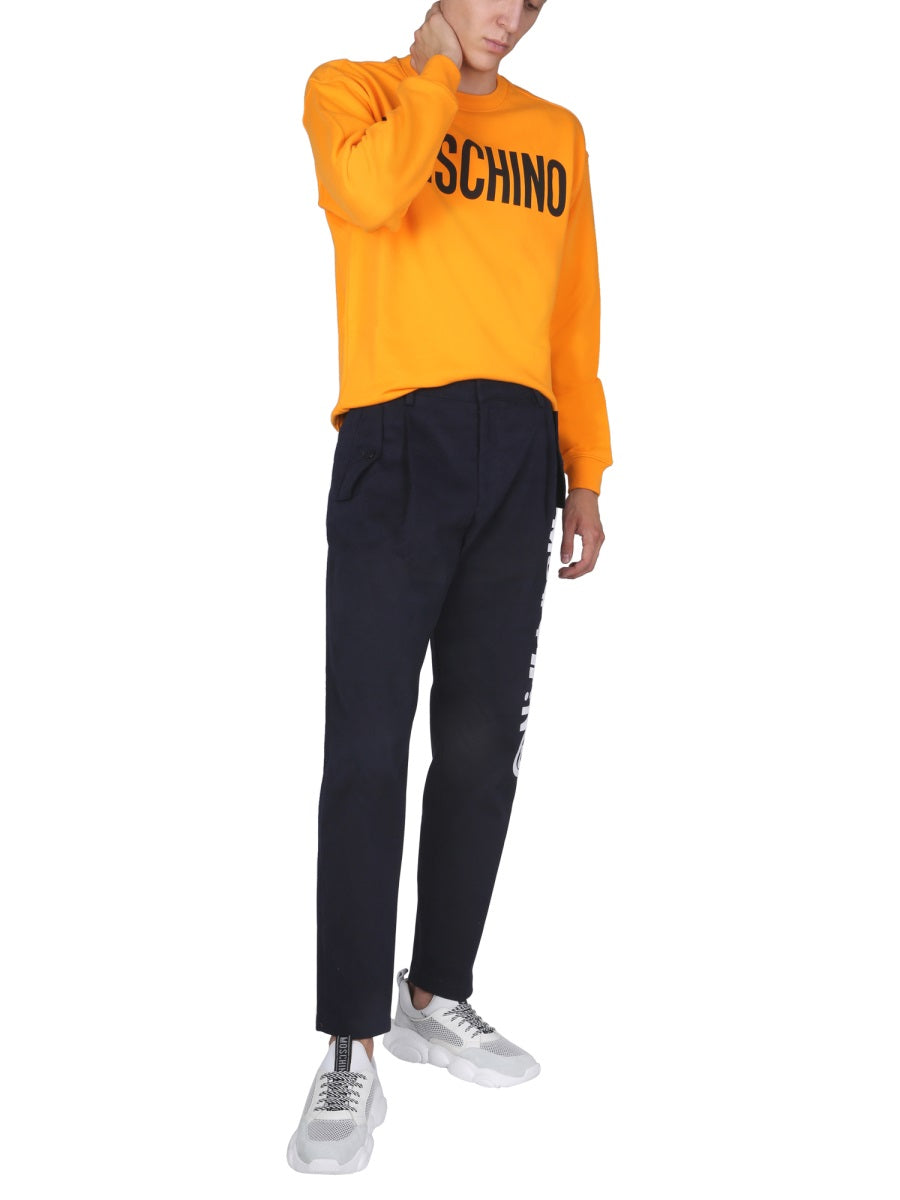 MOSCHINO Symbols Logo Trousers - FW21 Collection