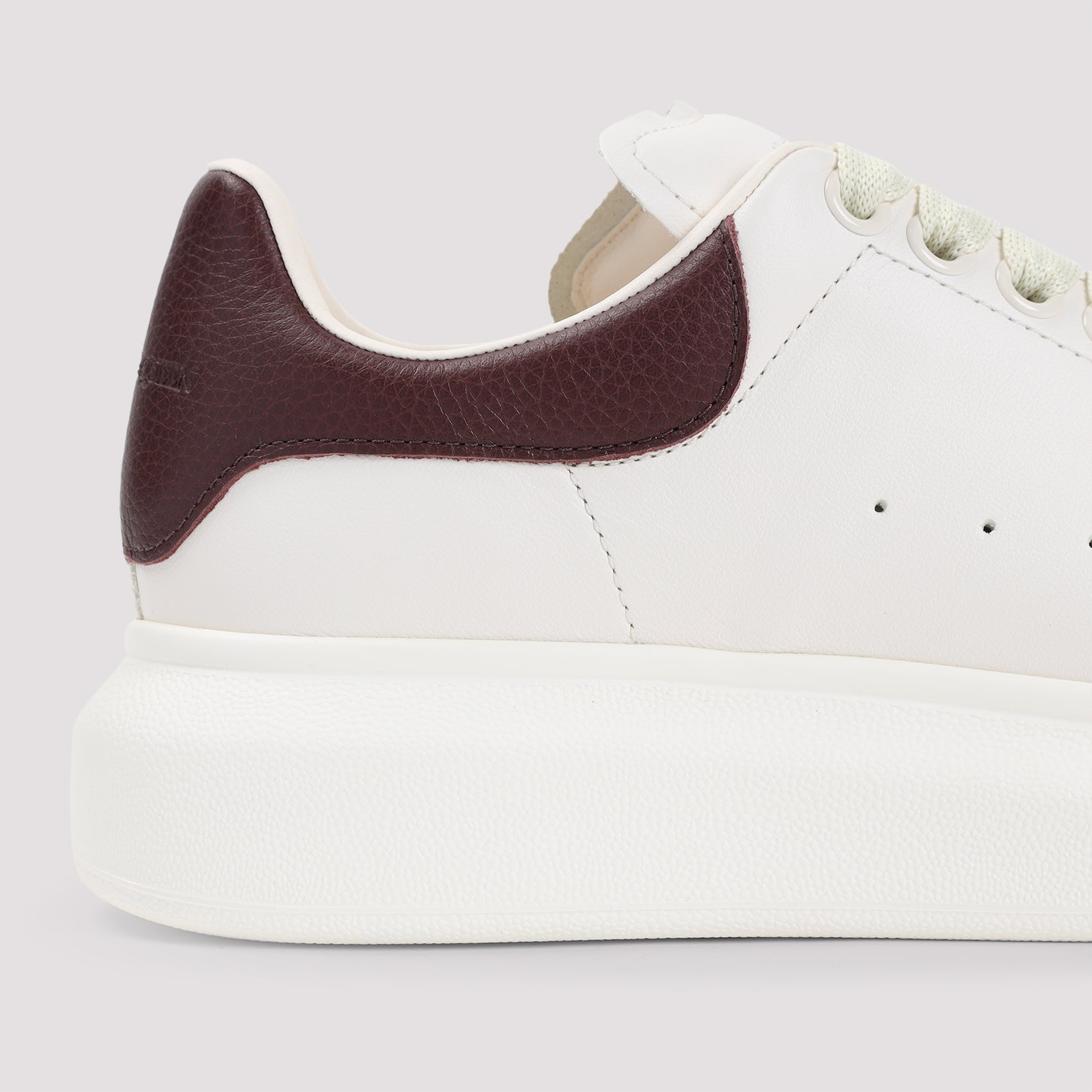 ALEXANDER MCQUEEN Chic Leather Sneakers with Contrasting Heel