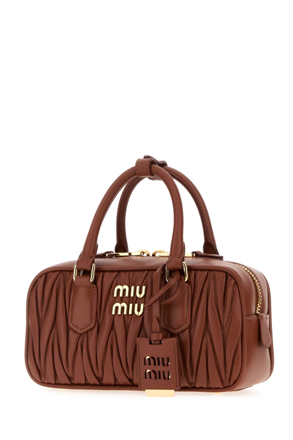MIU MIU Matelassé Leather Handbag - Mini Elegance