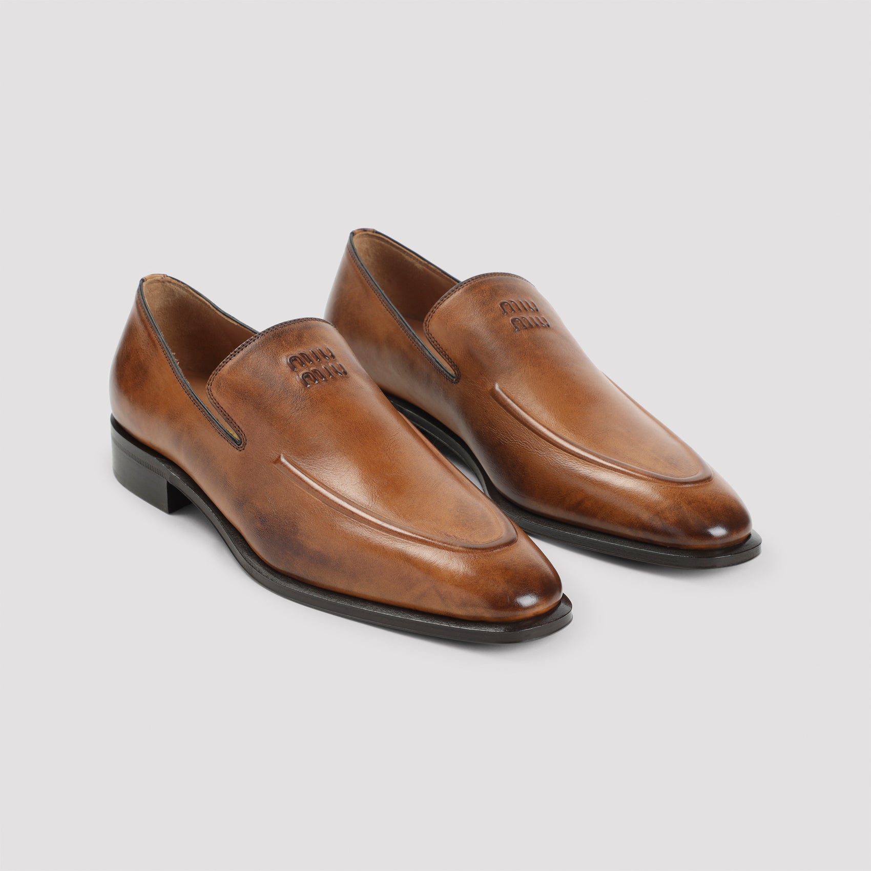 MIU MIU Leather Loafers with Elongated Almond Toe for Women