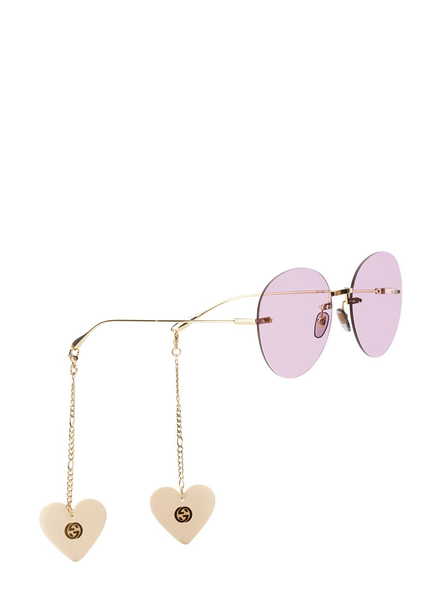 GUCCI Round Frame Sunglasses with Heart-Shaped Pendants