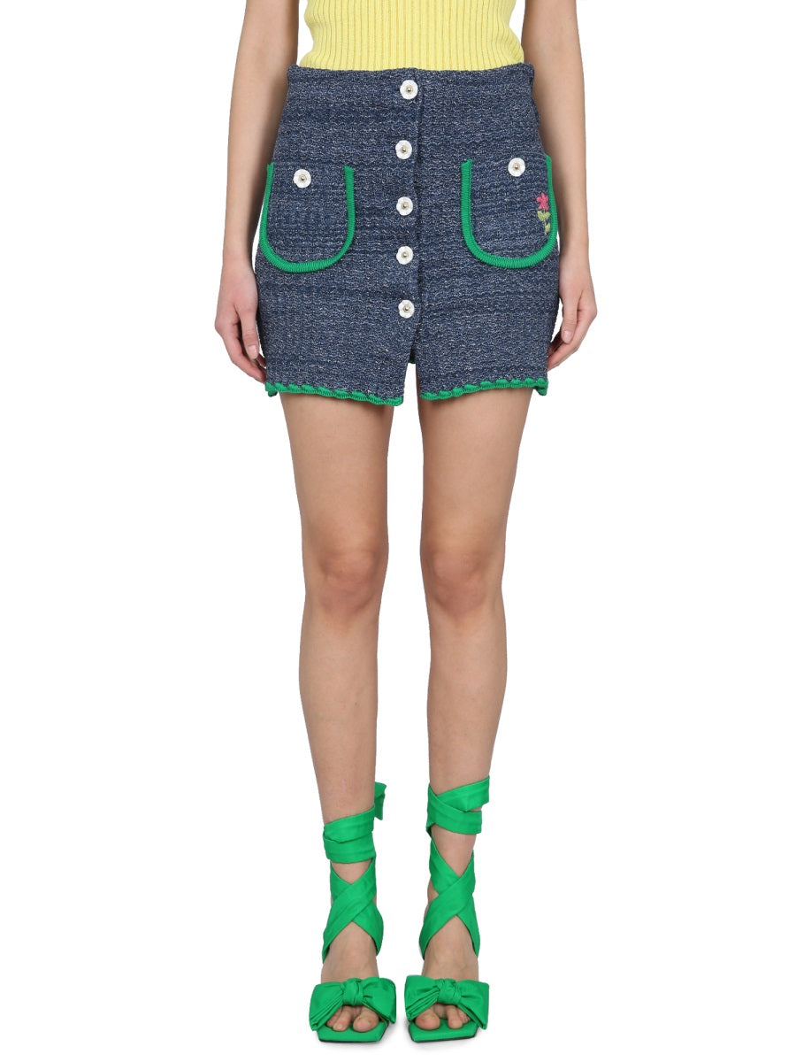 CORMIO Mini Clear Skirt with Front Button Closure