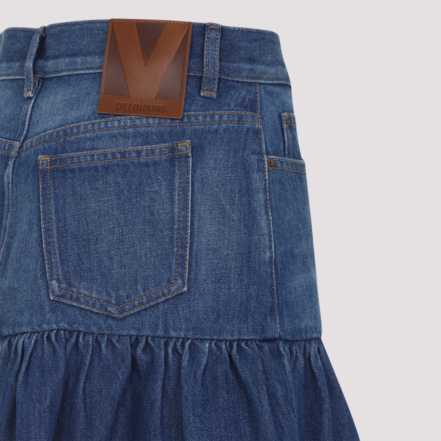 VALENTINO GARAVANI Women's Mini Denim Skirt with Flounce Detail