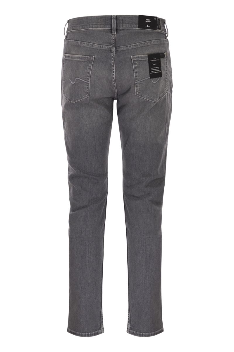 7 FOR ALL MANKIND Slimmy Tapered Mid-Rise Jeans - Men