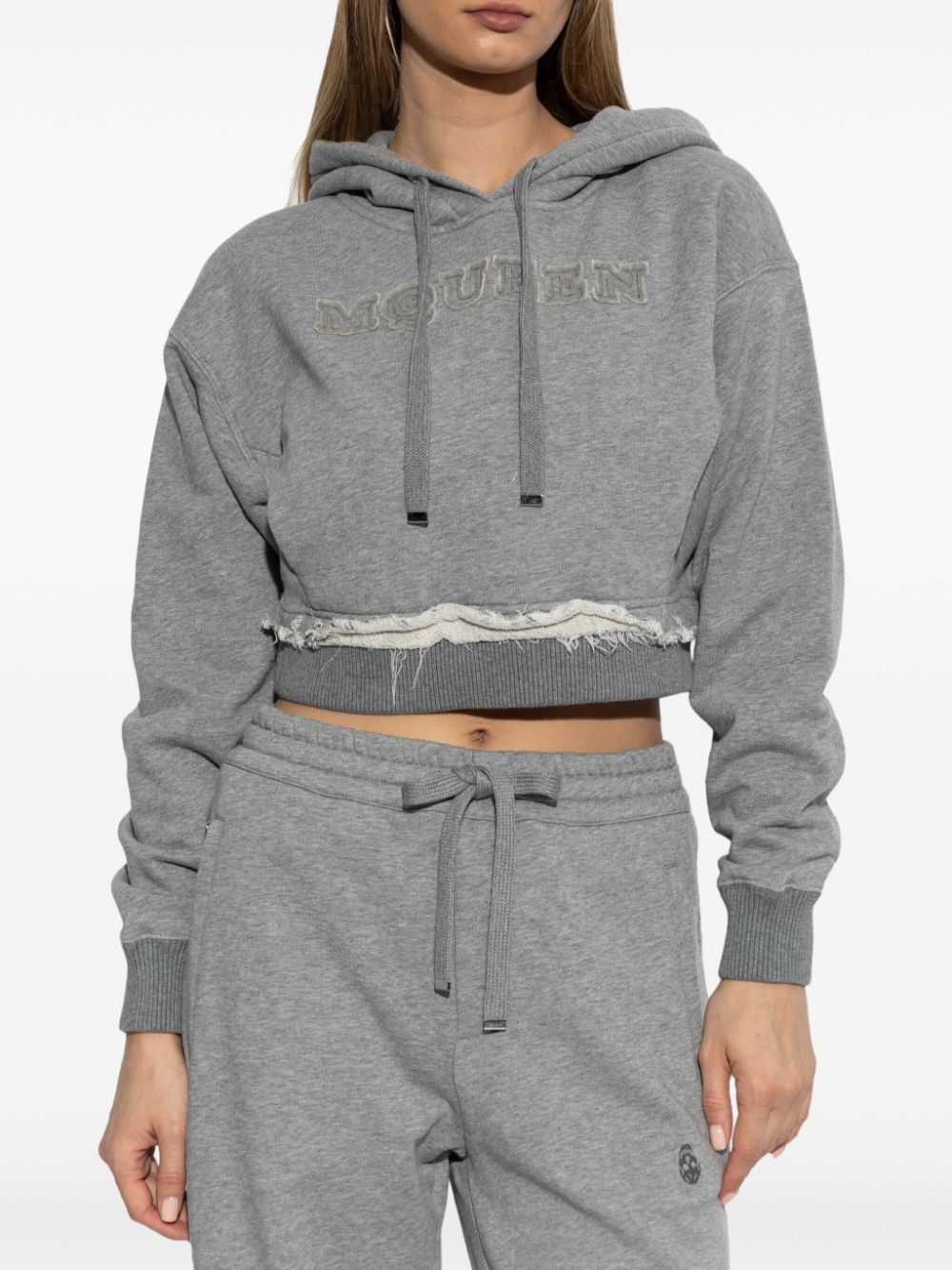 ALEXANDER MCQUEEN Cozy Hoodie Sweater with Drawstring and Distressed Finish