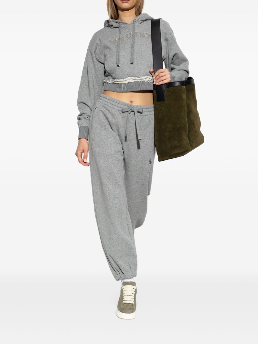 ALEXANDER MCQUEEN Cozy Hoodie Sweater with Drawstring and Distressed Finish