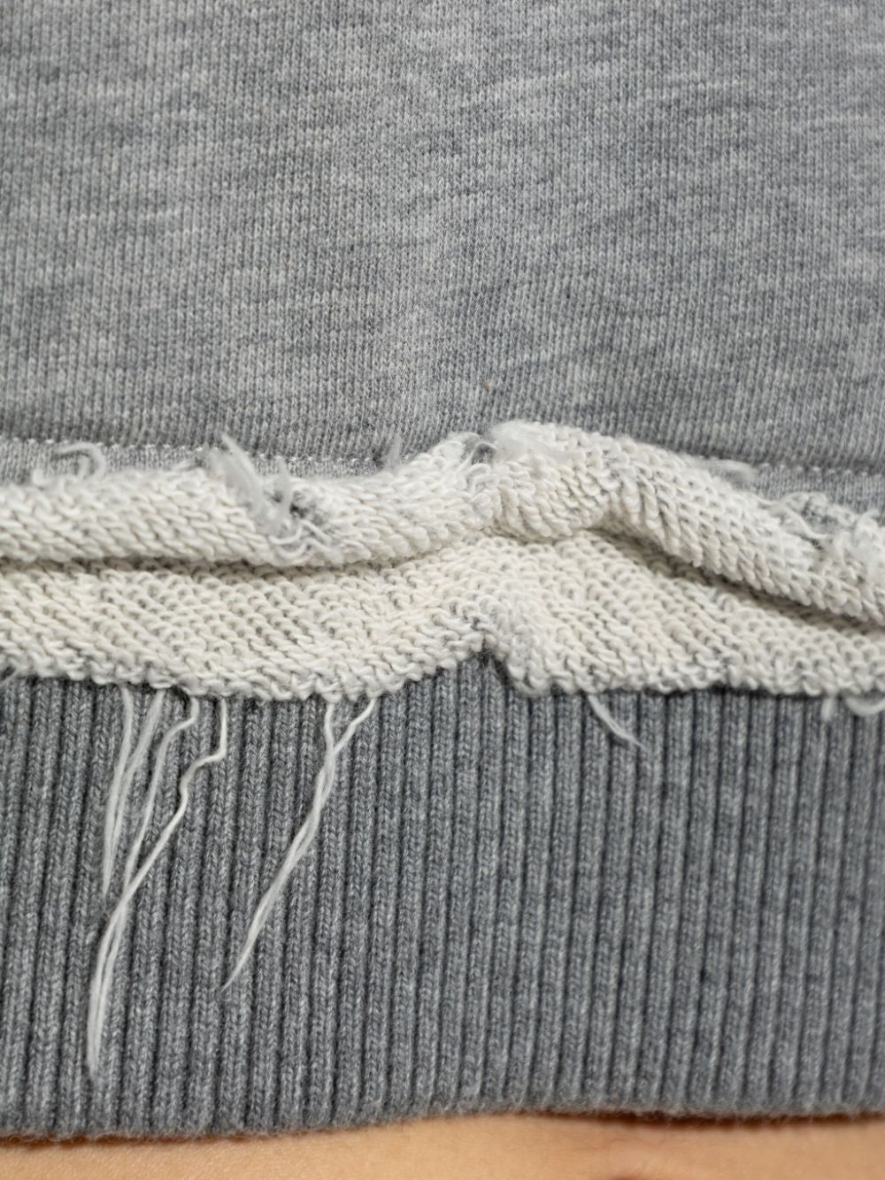 ALEXANDER MCQUEEN Cozy Hoodie Sweater with Drawstring and Distressed Finish