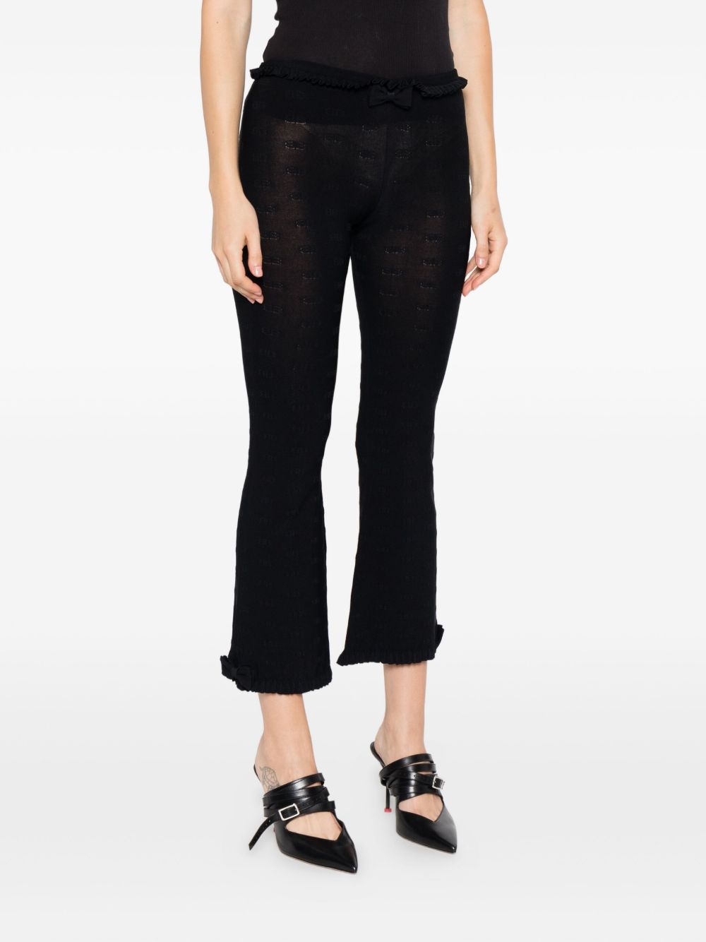 BALENCIAGA Flared Capri Trousers with Ruffled Trim and Bow Detail