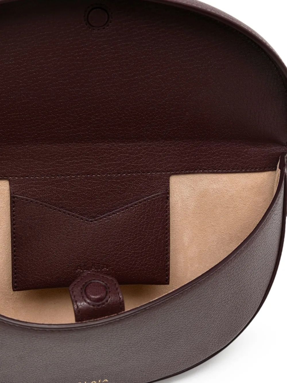 ALAIA Curved Mini Crossbody Handbag with Adjustable Strap