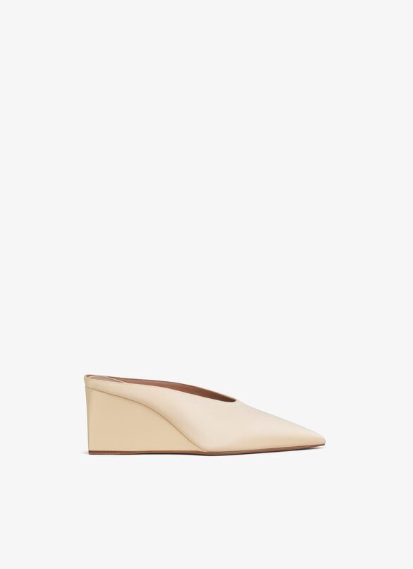 ALAIA Sand Bucket Wedge Flats for Women