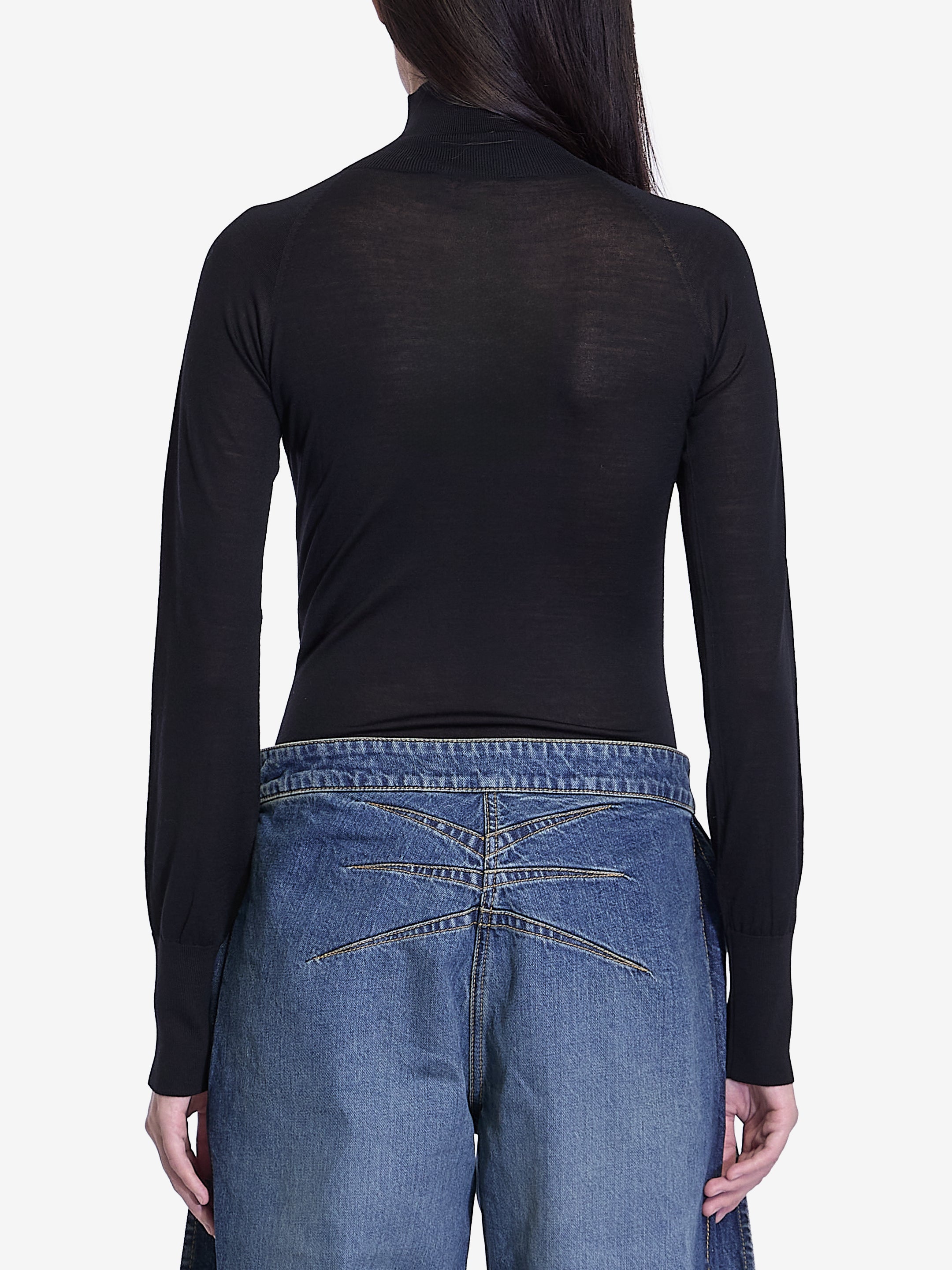 ALAIA Fitted High Collar Bodysuit in Fine Wool