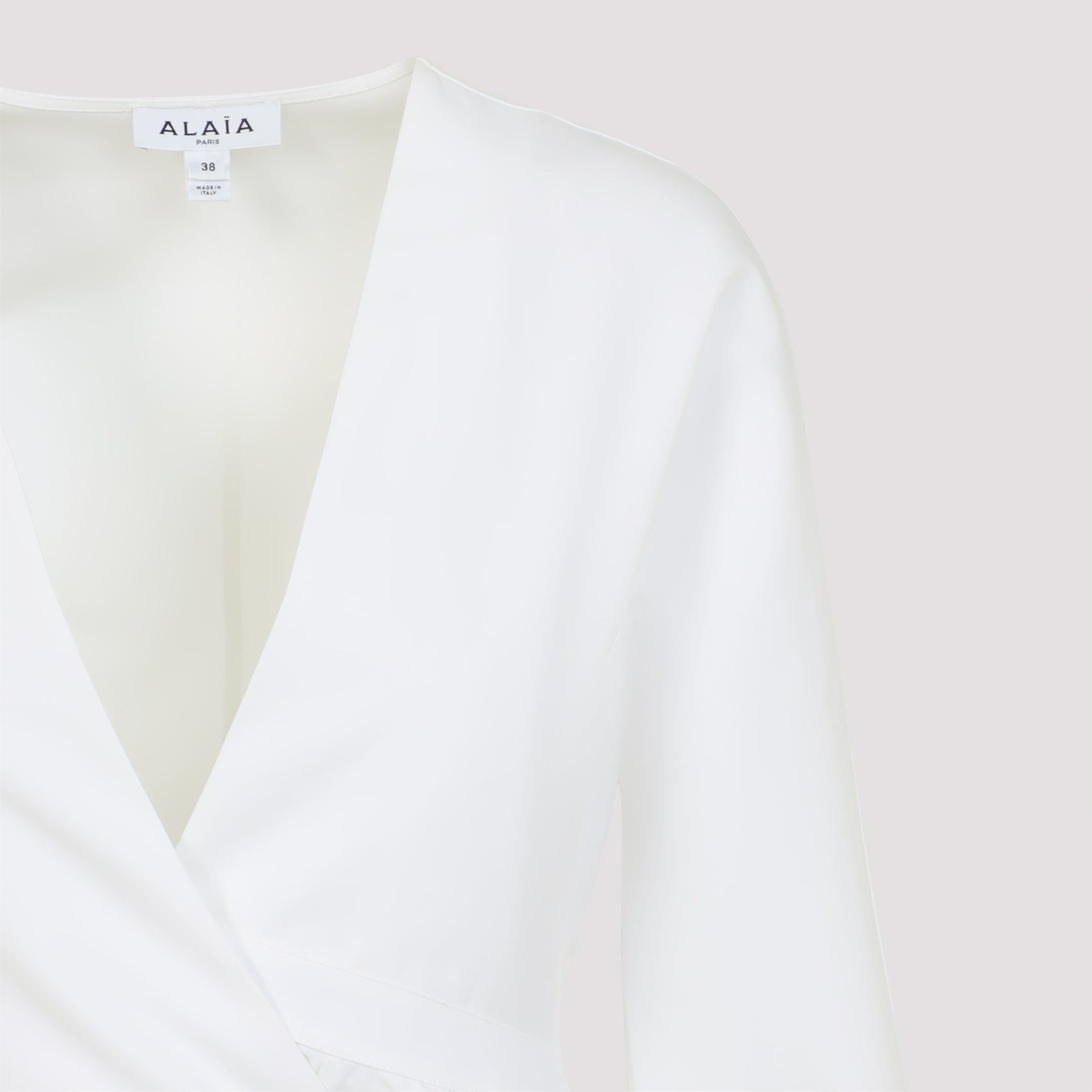 ALAIA Asymmetrical Belt Mini Dress