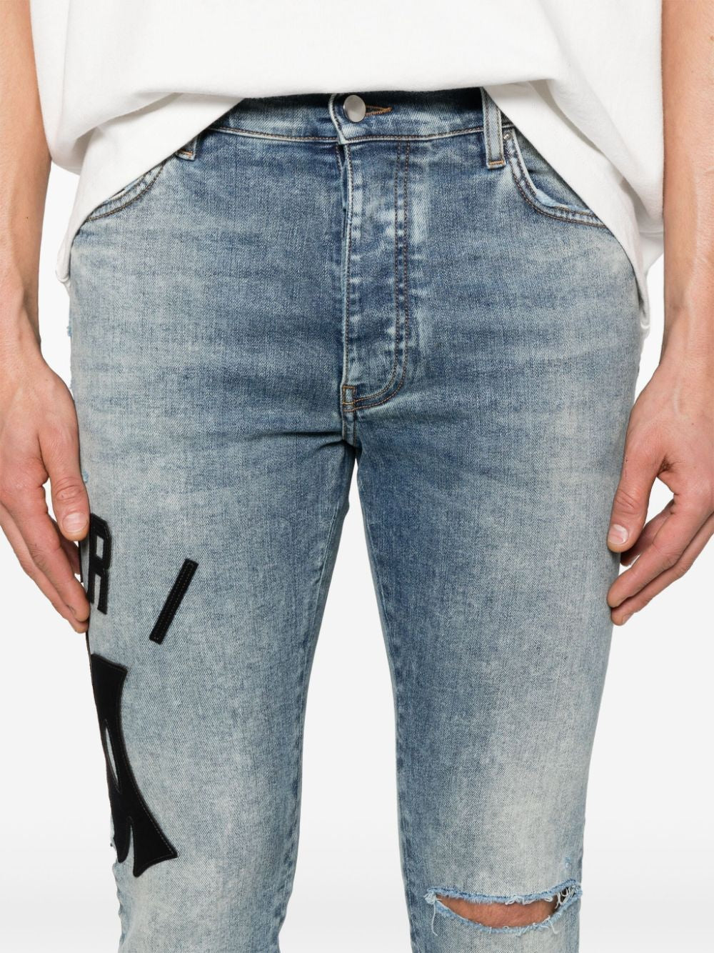 AMIRI Skinny Jean with Suede Applique Logo