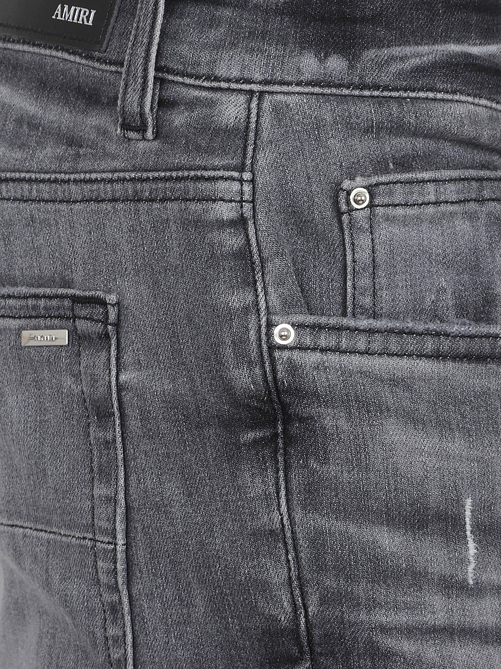 AMIRI Trendy Ripped Jeans for Men - Classic Fit