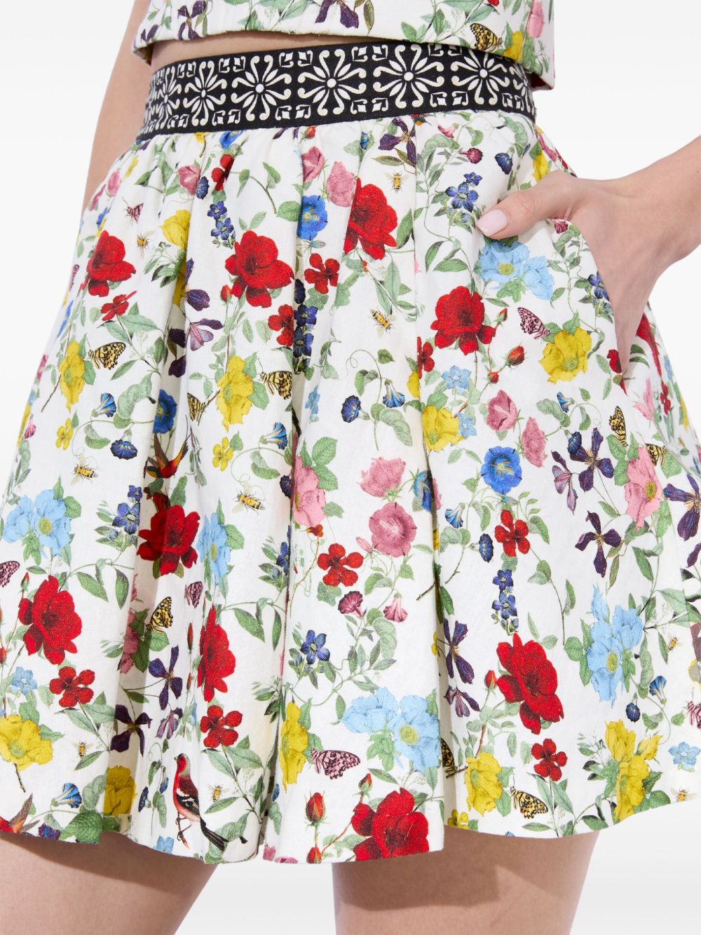ALICE + OLIVIA Floral Print Mini Skirt with Exposed Zip and Side Pockets