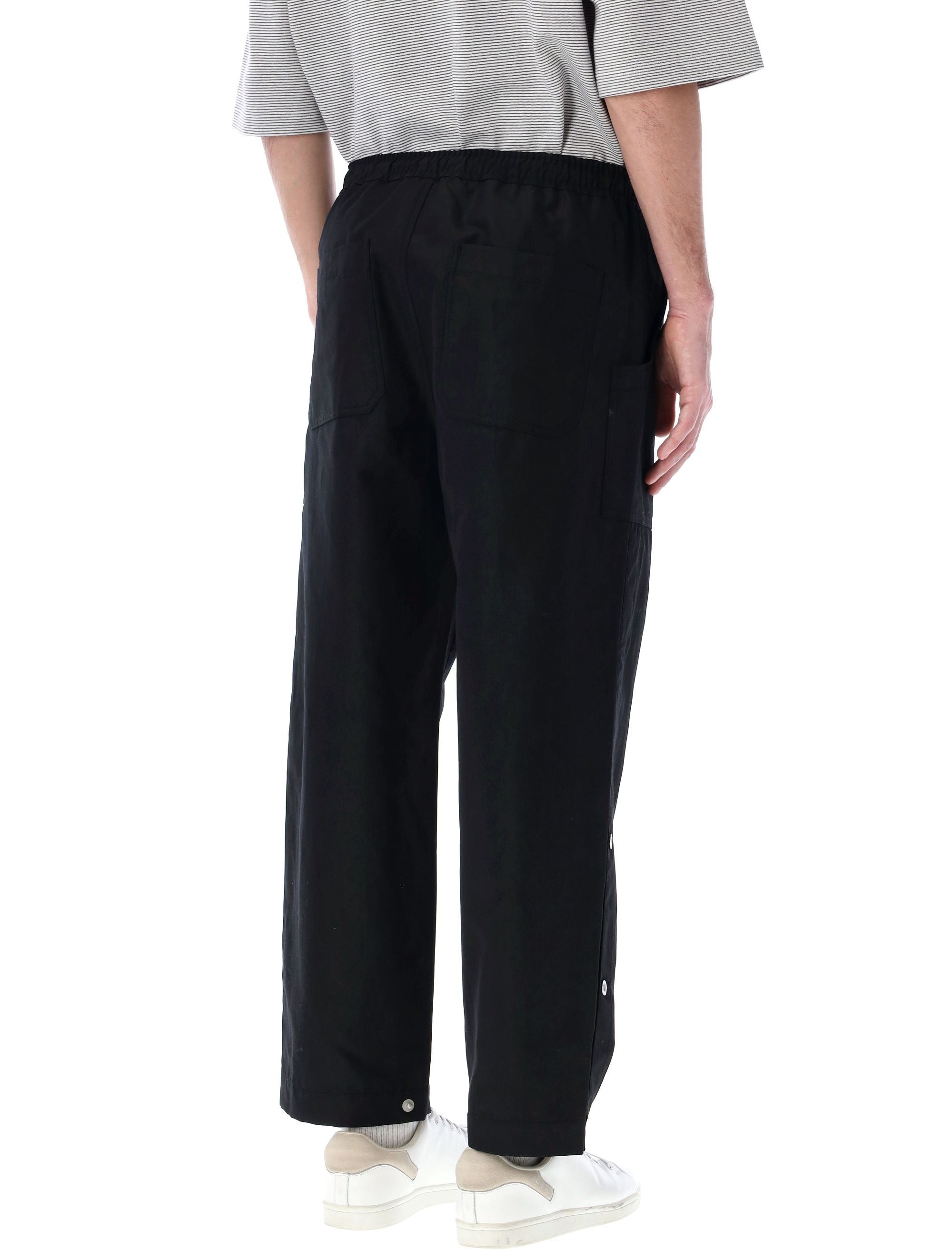 COMME DES GARÇONS HOMME Buttoned Loose Fit Pants for Men