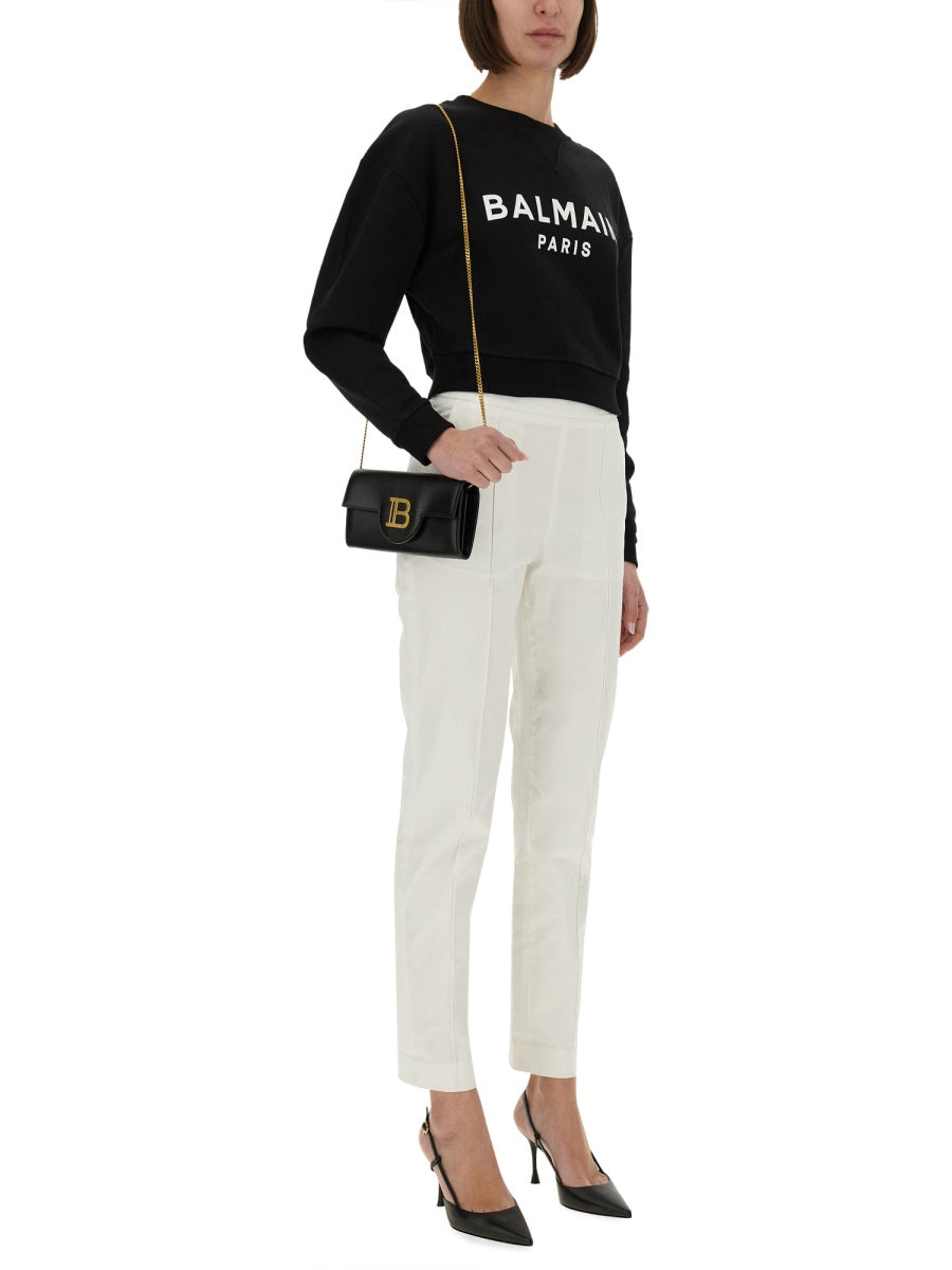BALMAIN Cropped Logo Sweatshirt with Embossed Buttons - Women's - Size S