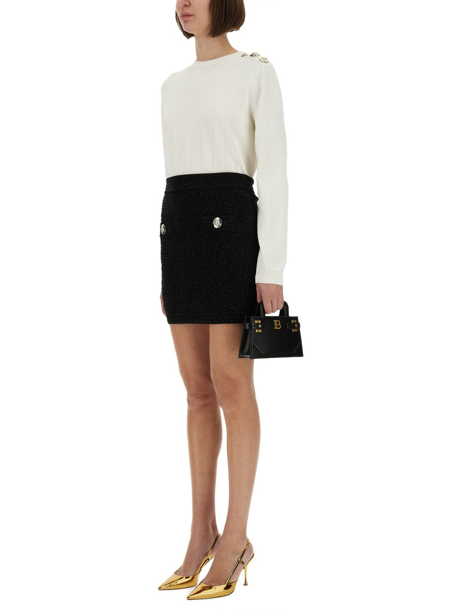 BALMAIN Glamorous High-Waisted Mini Skirt with Decorative Pockets - Size 38