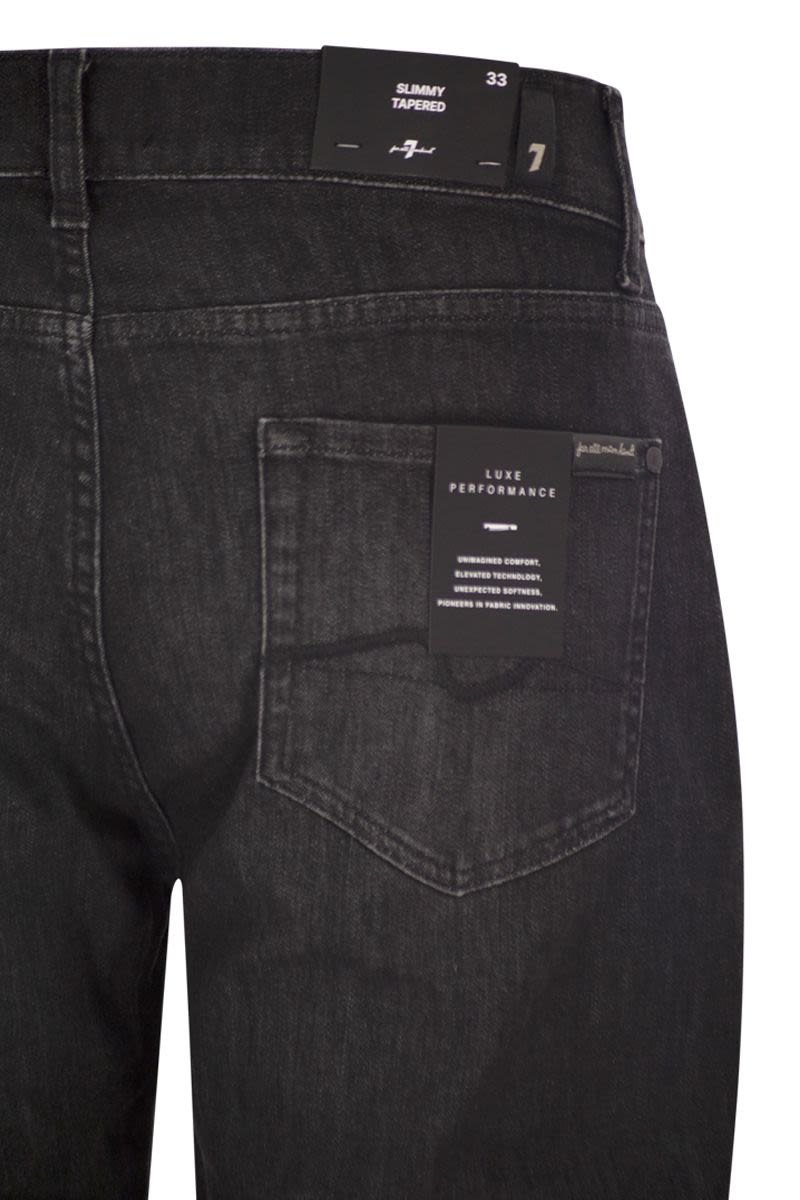 7 FOR ALL MANKIND Slimmy Tapered - Medium-Waisted Jeans for Men