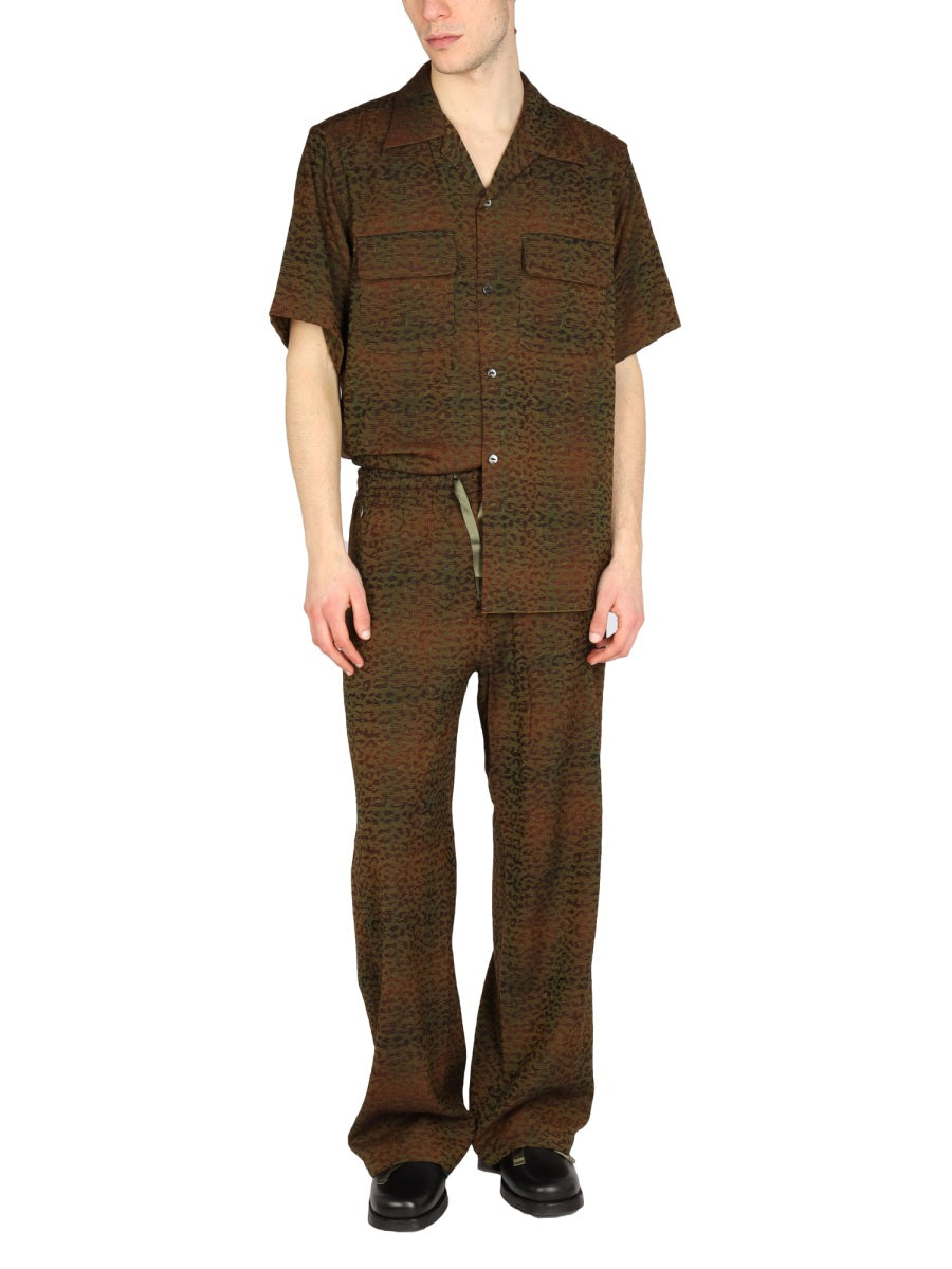 NEEDLES Animalier Print Pants with Elastic Drawstring for Men