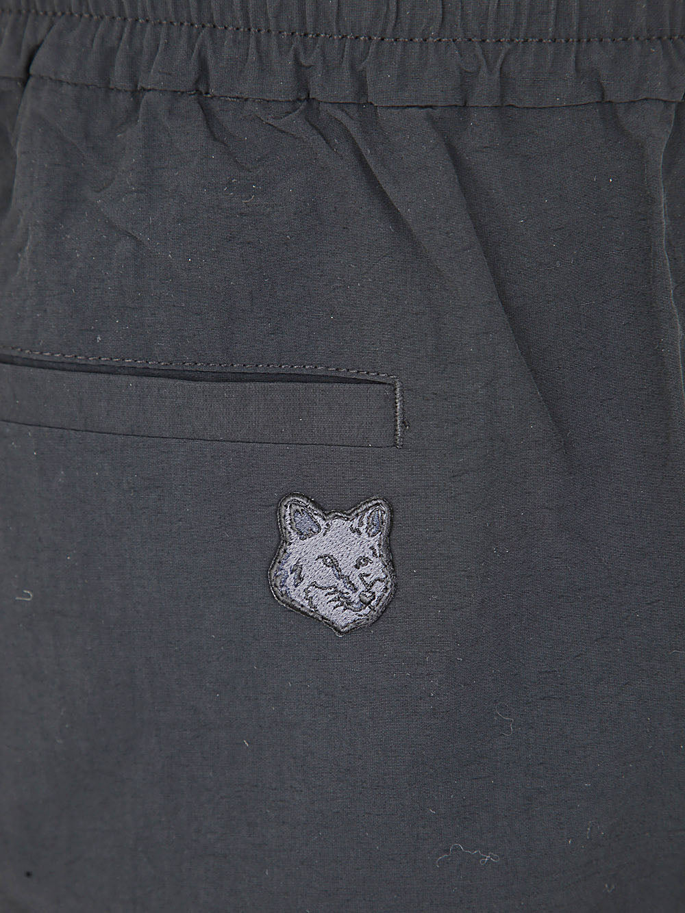 MAISON KITSUNÉ Crispy Nylon City Pants with Tonal Fox Head Design