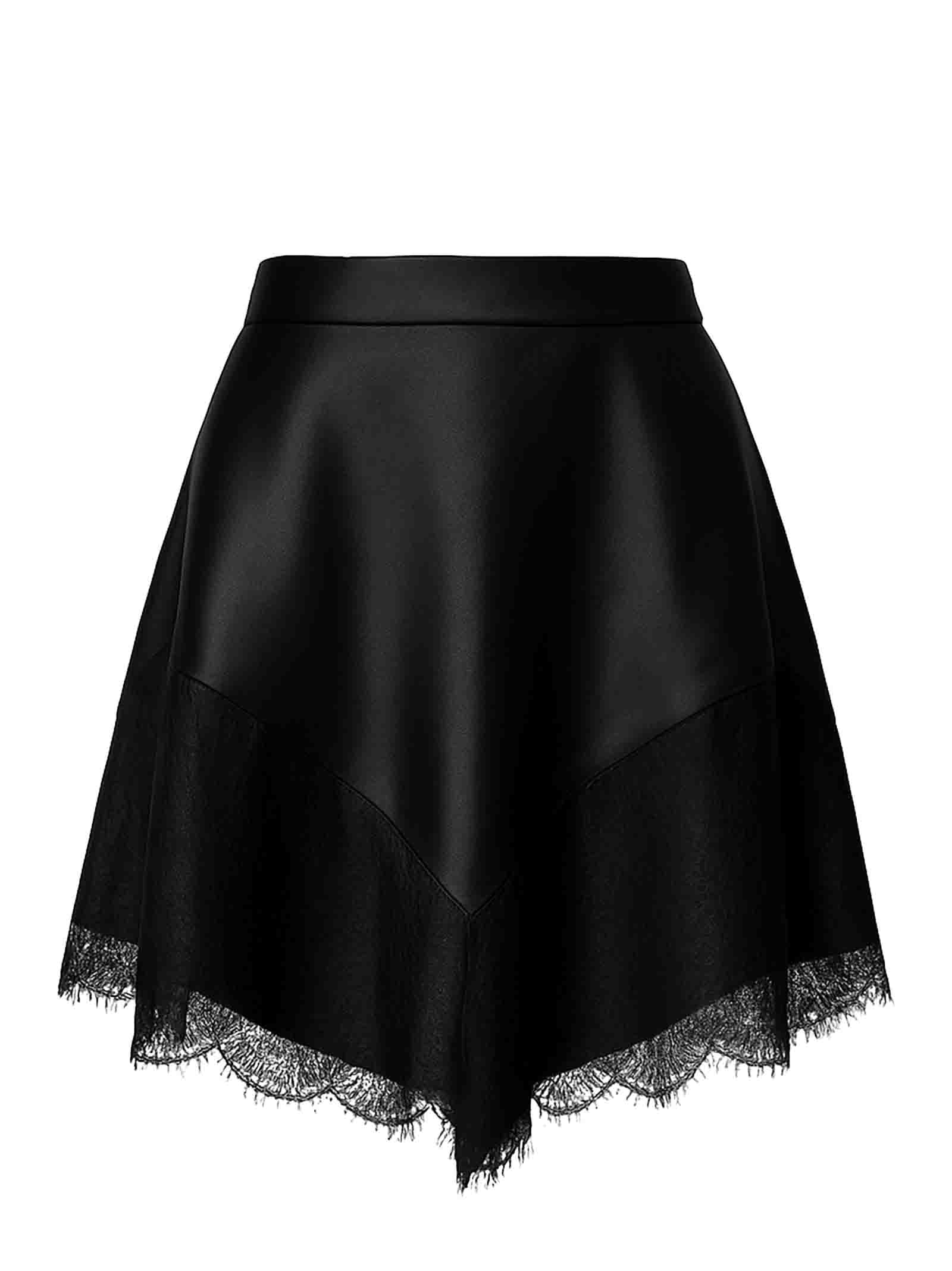 NINA RICCI Chic Mini Skirt with Floral Lace Inserts