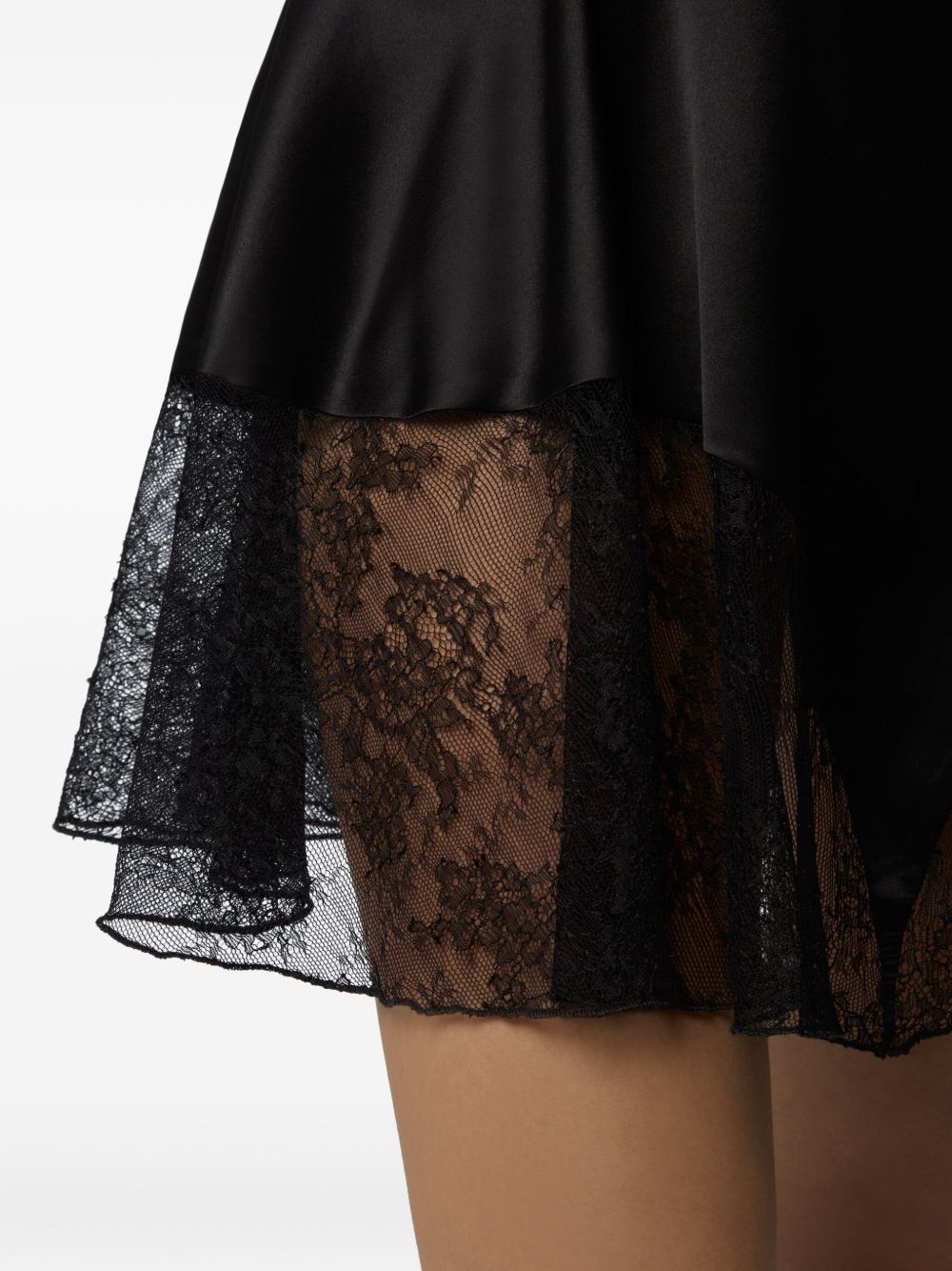 NINA RICCI Chic Mini Skirt with Floral Lace Inserts