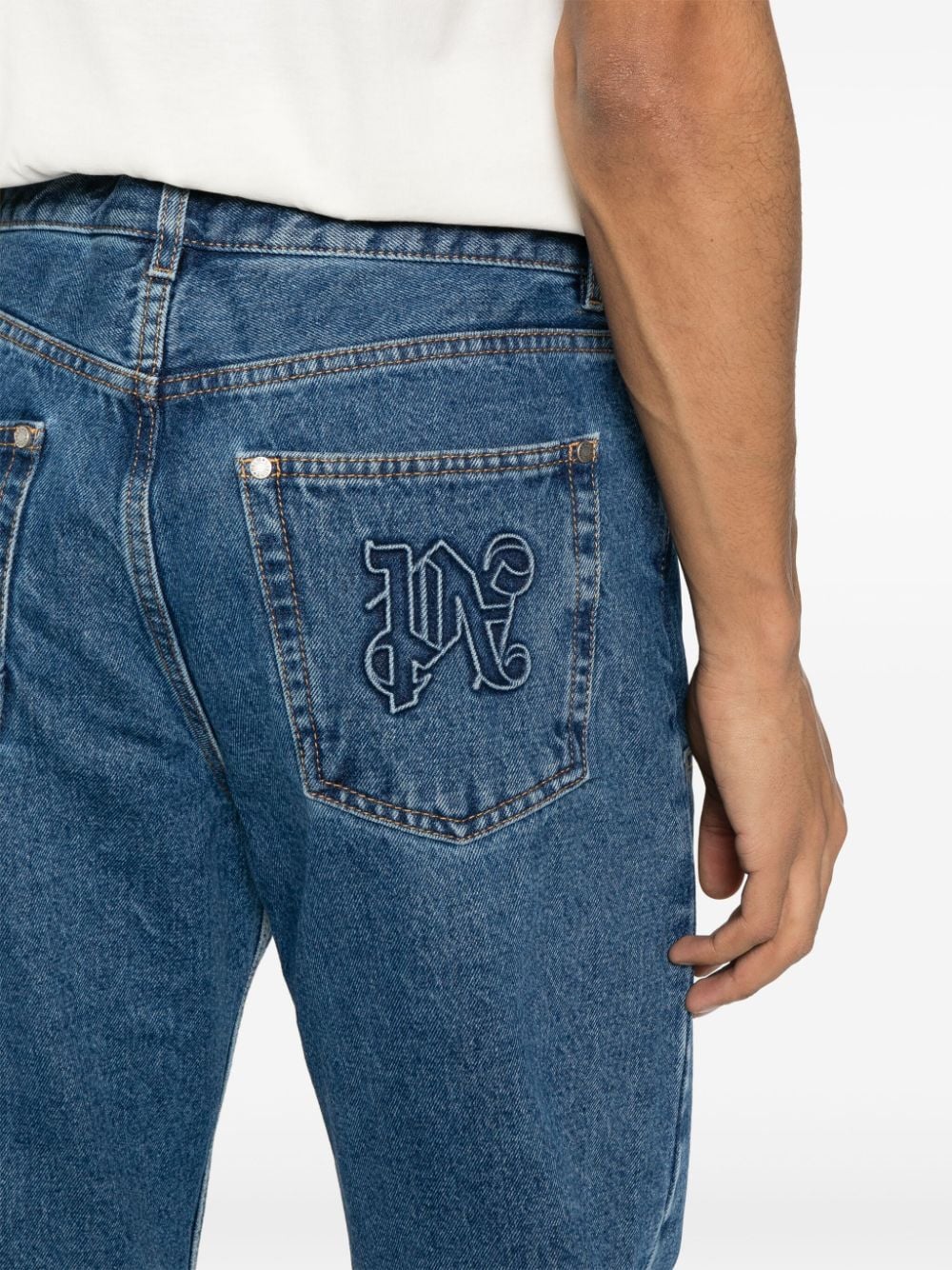 PALM ANGELS Monogram Denim Jeans - Mid Wash with Contrast Stitching