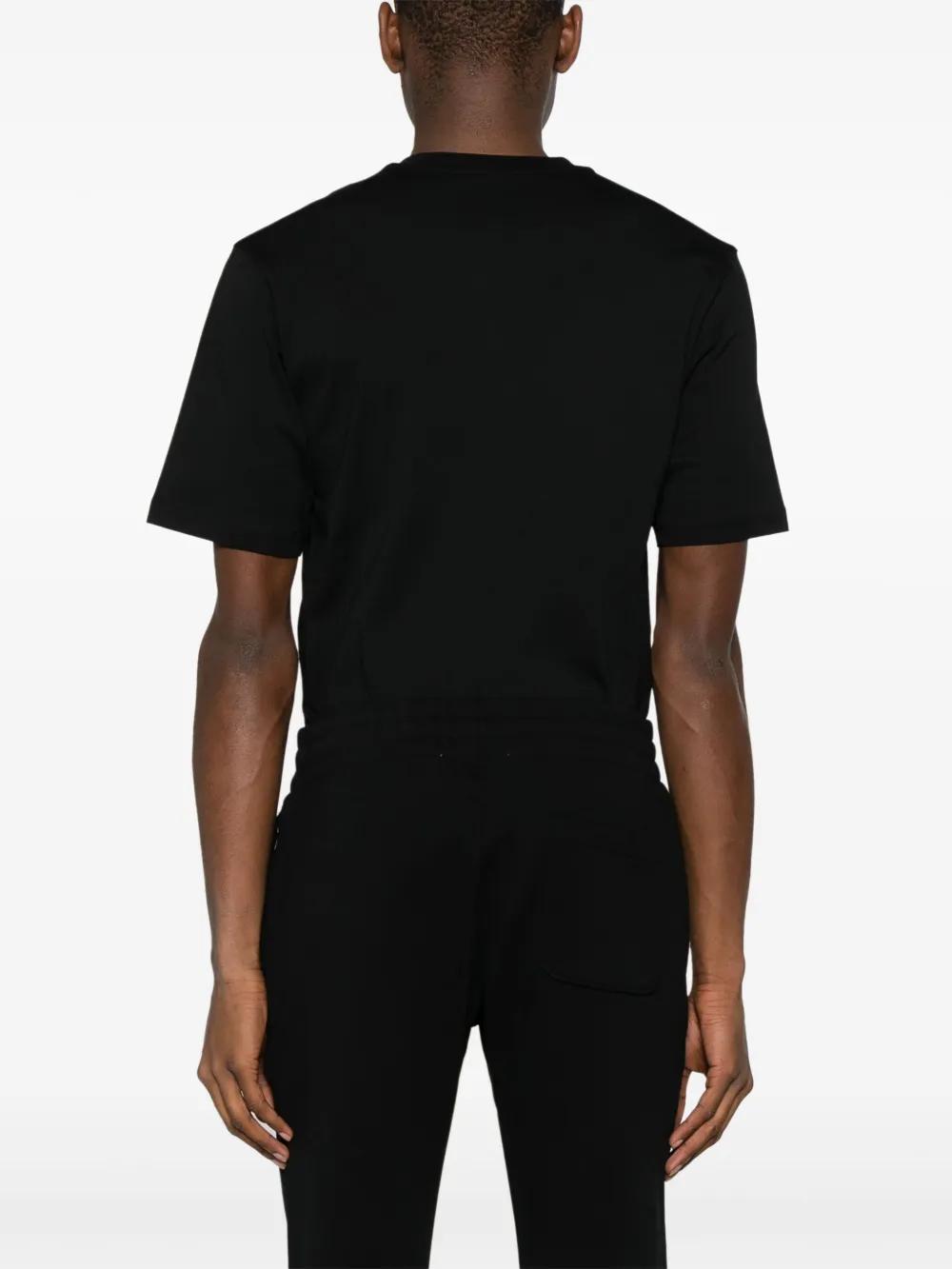 MOSCHINO COUTURE Patterned Cotton Trousers for Men