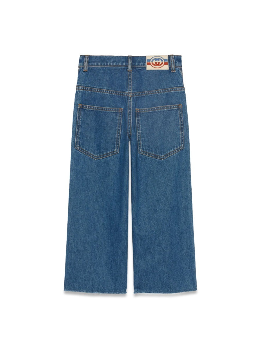 GUCCI Mini Skate Pants in Organic Broken Denim