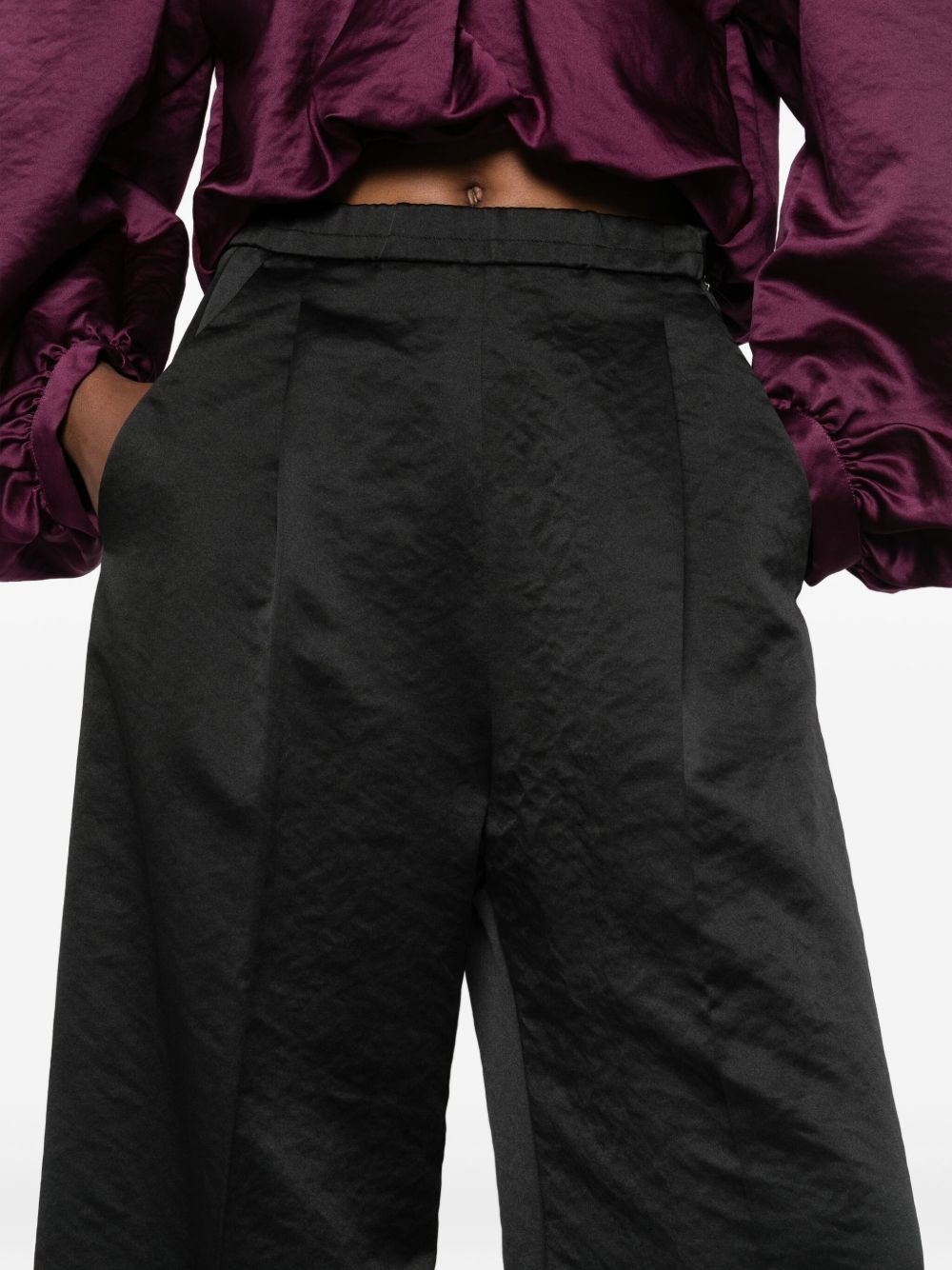 FORTE FORTE Flared Leg Trousers with Pleated Design