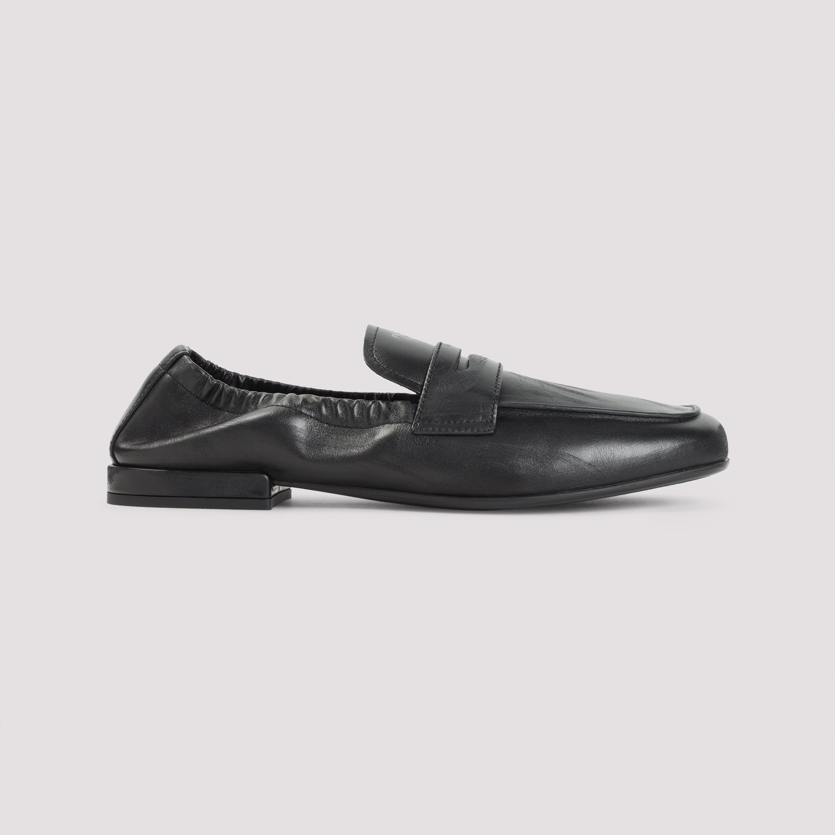 PRADA Antique-Inspired Loafers with Shuffle Screen Printed Logo
