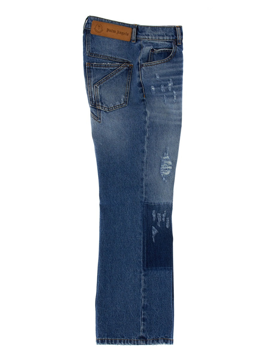 MONCLER GENIUS Vintage Effect Denim Jeans with Star Inlays for Men