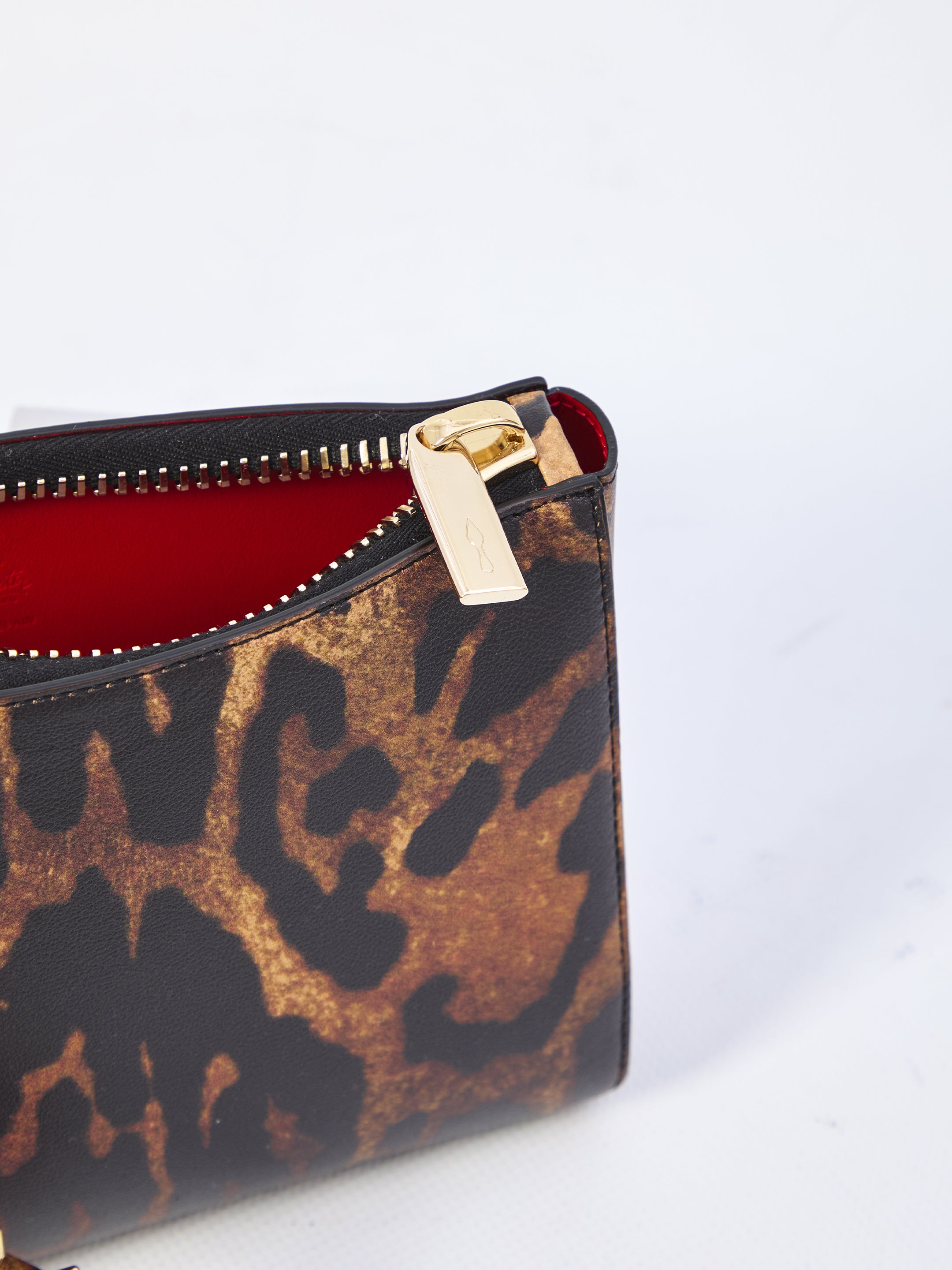 CHRISTIAN LOUBOUTIN Mini Pouch Handbag with Unique Leather Characteristic