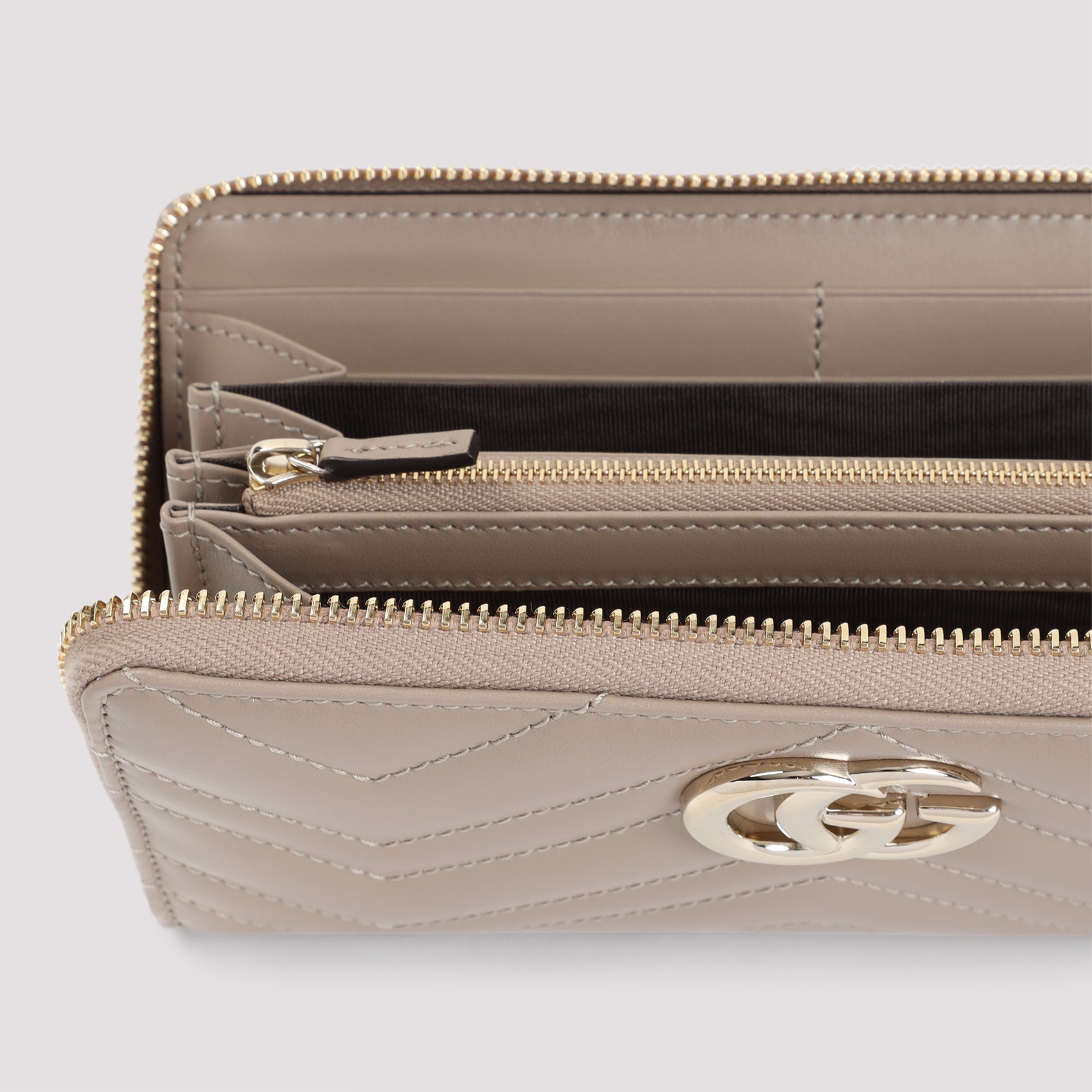 GUCCI Mini Quilted GG Zip Around Wallet