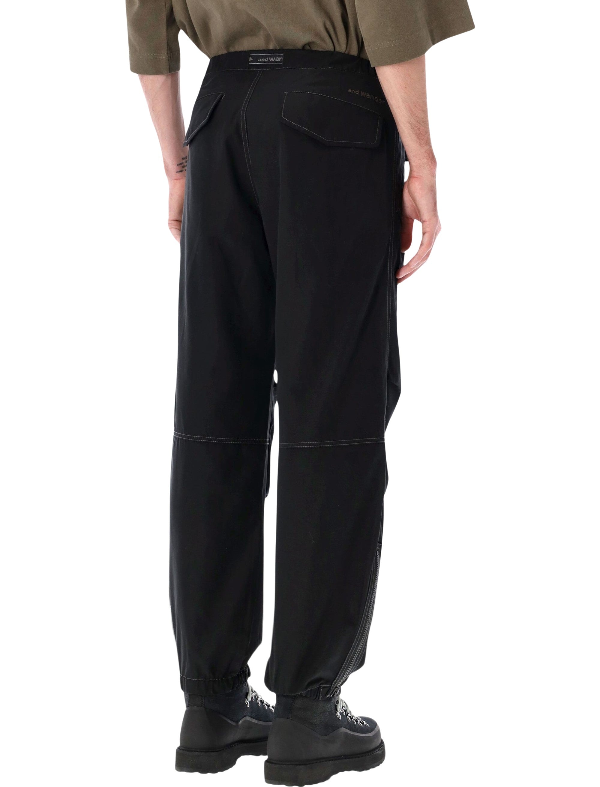 AND WANDER High Count Cloth Side Zip Hem Pants - Size L