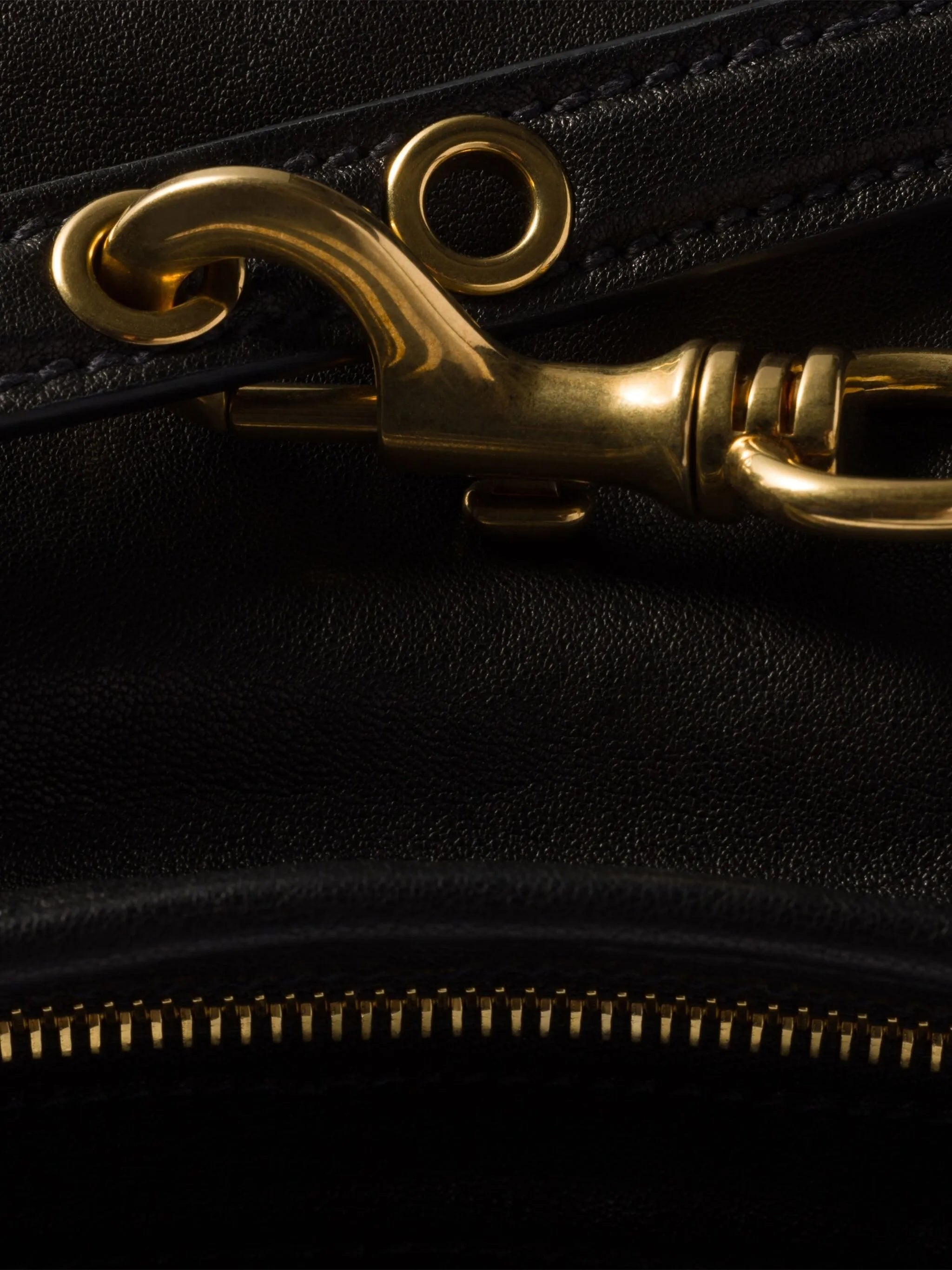 MIU MIU Elegant Shoulder Bag with Gold Detailing