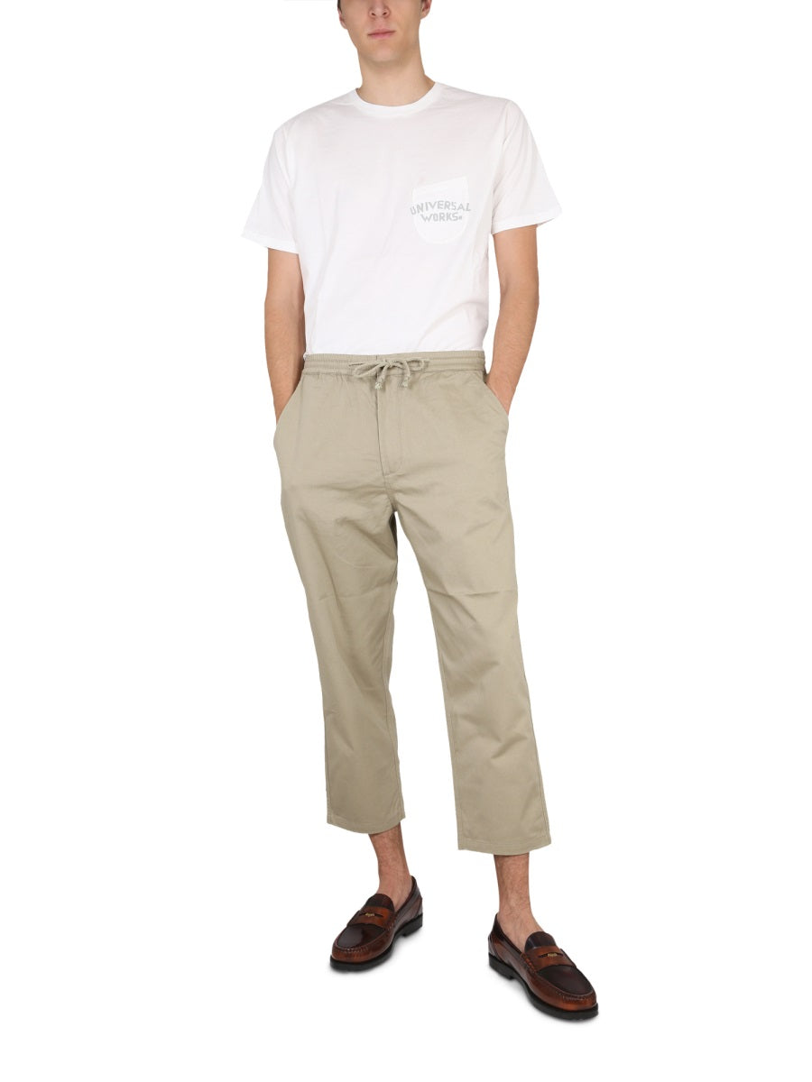 UNIVERSAL WORKS Cropped Fit Trousers for Men