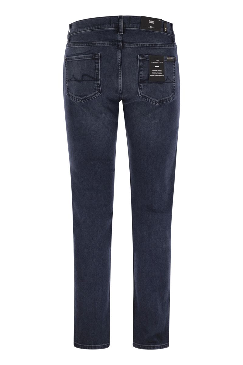 7 FOR ALL MANKIND Slimmy Tapered Medium-Waisted Jeans