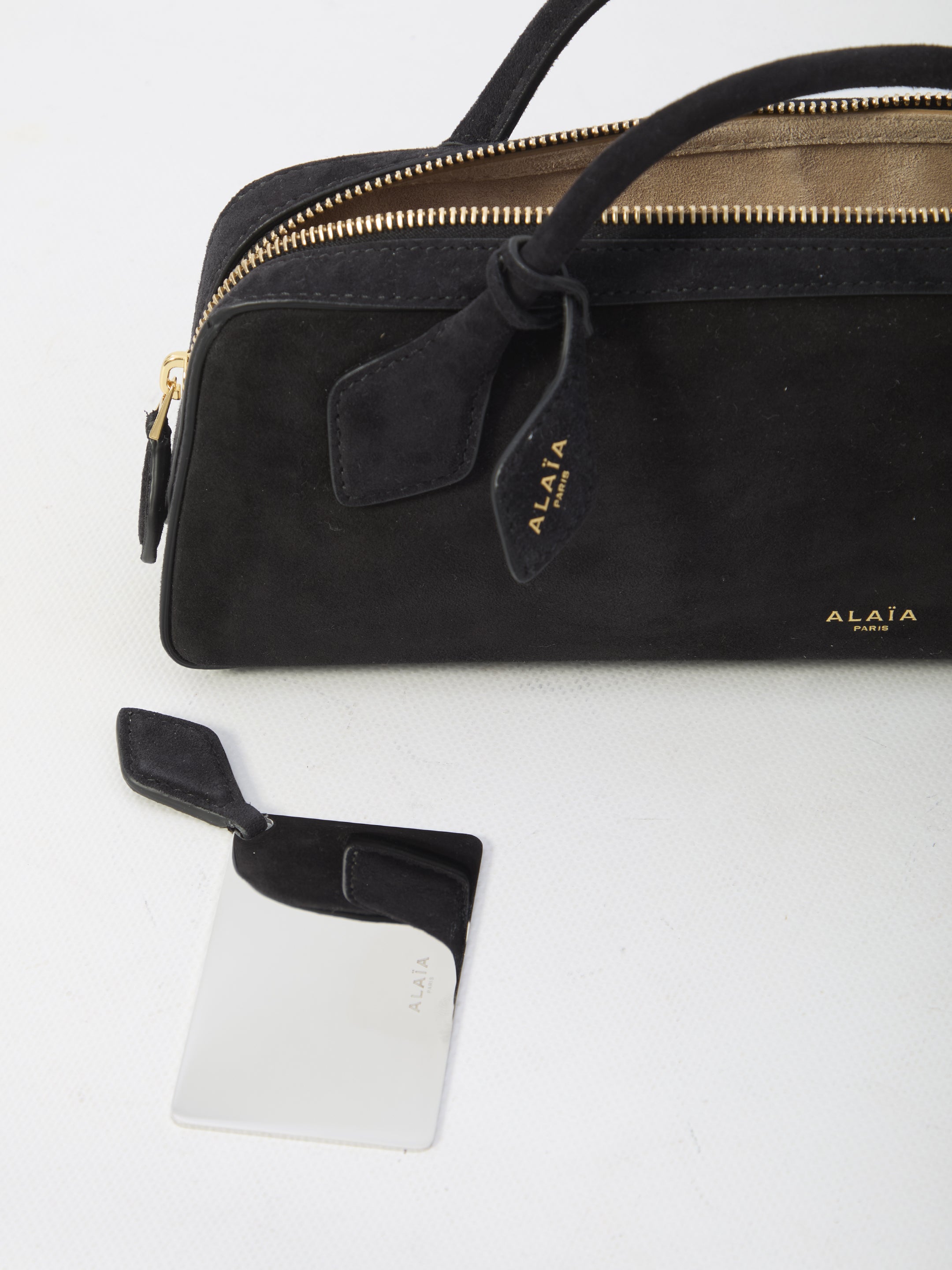 ALAIA Mini Teckel Clutch Bag