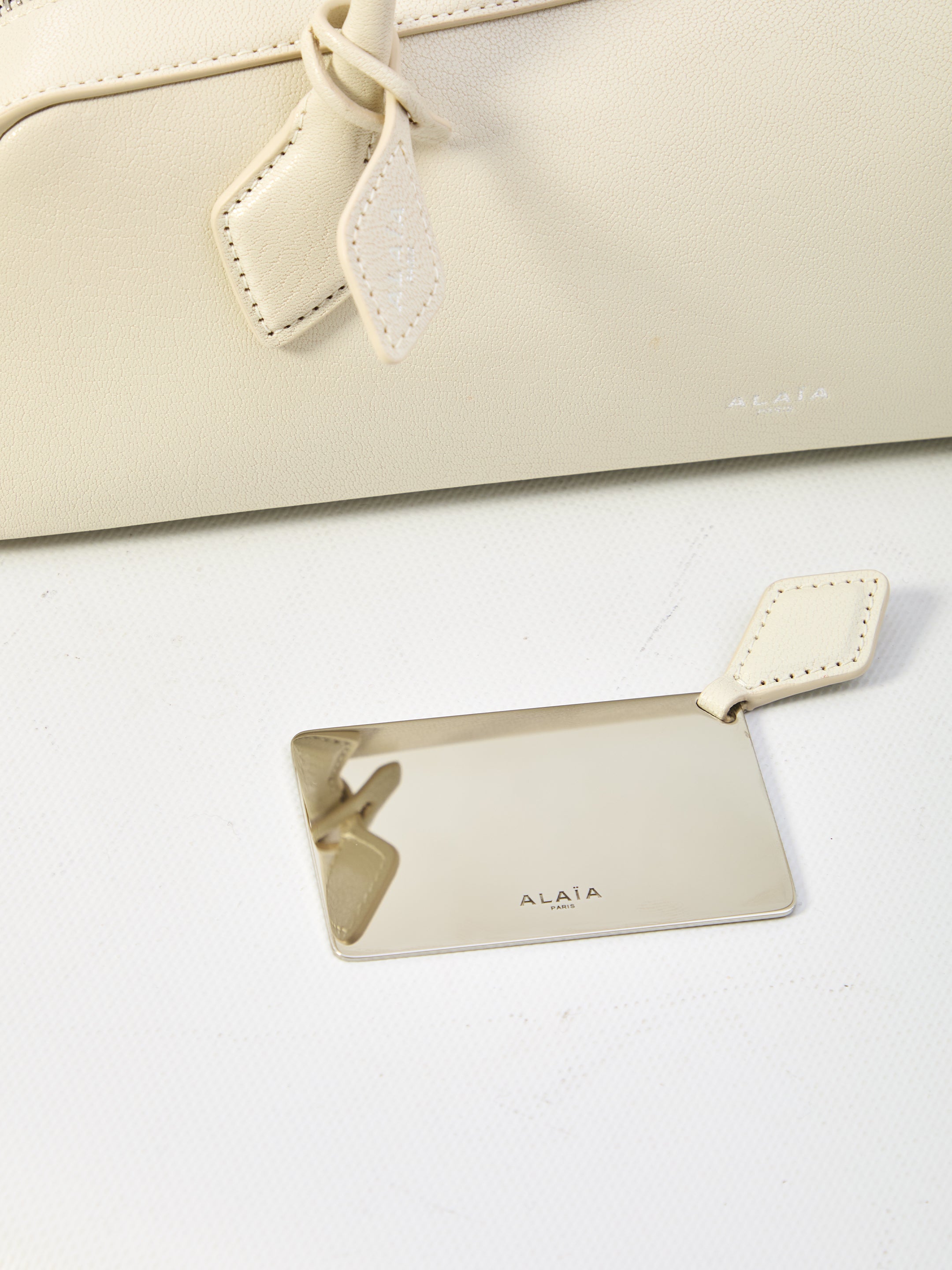 ALAIA Medium Handbag with Engraved Logo - 33x11x10 cm