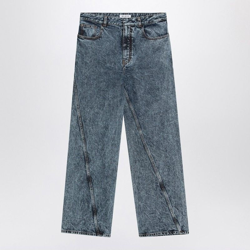ALAIA Twisted Stonewashed Denim Jeans