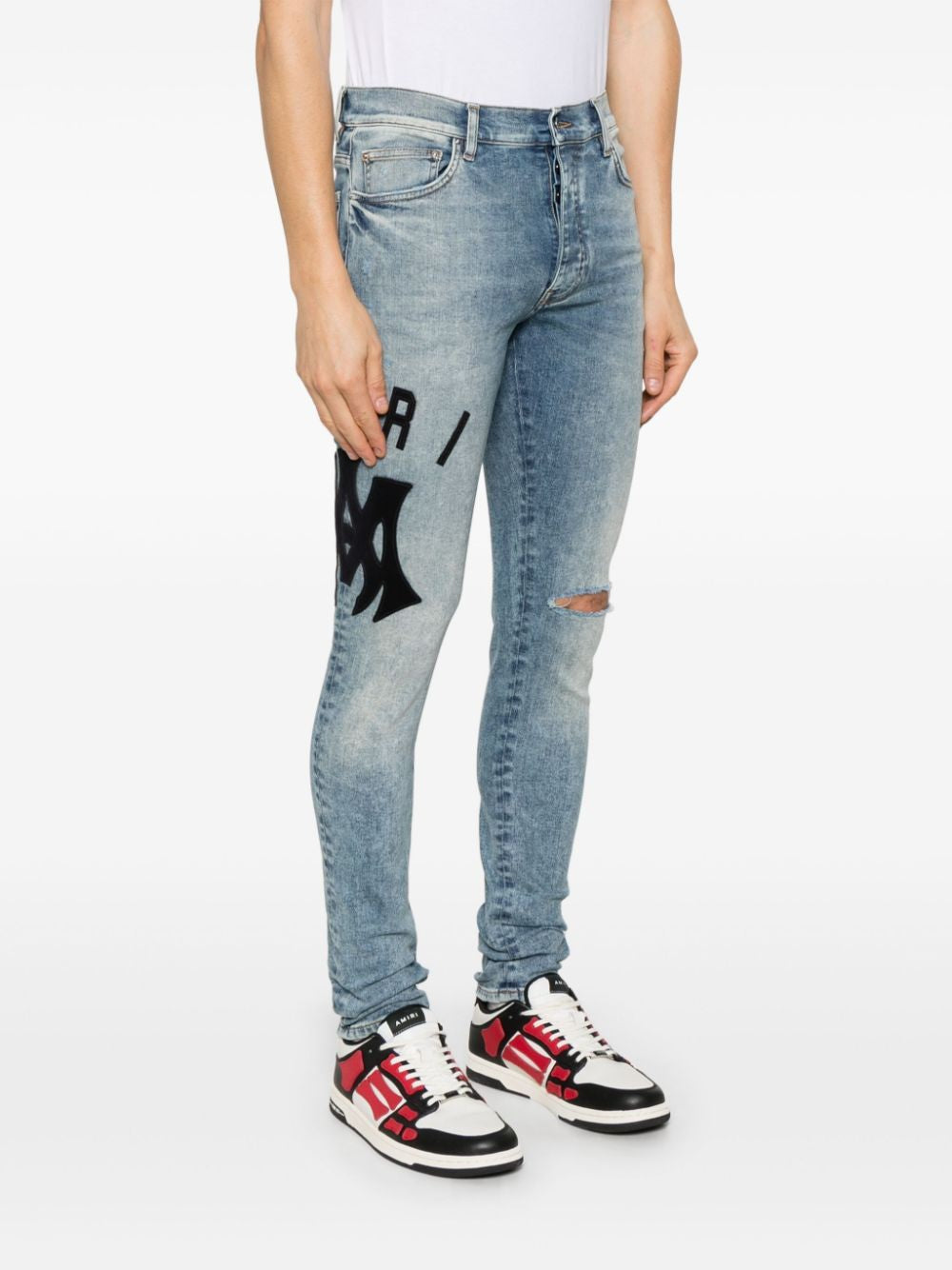 AMIRI Skinny Jean with Suede Applique Logo