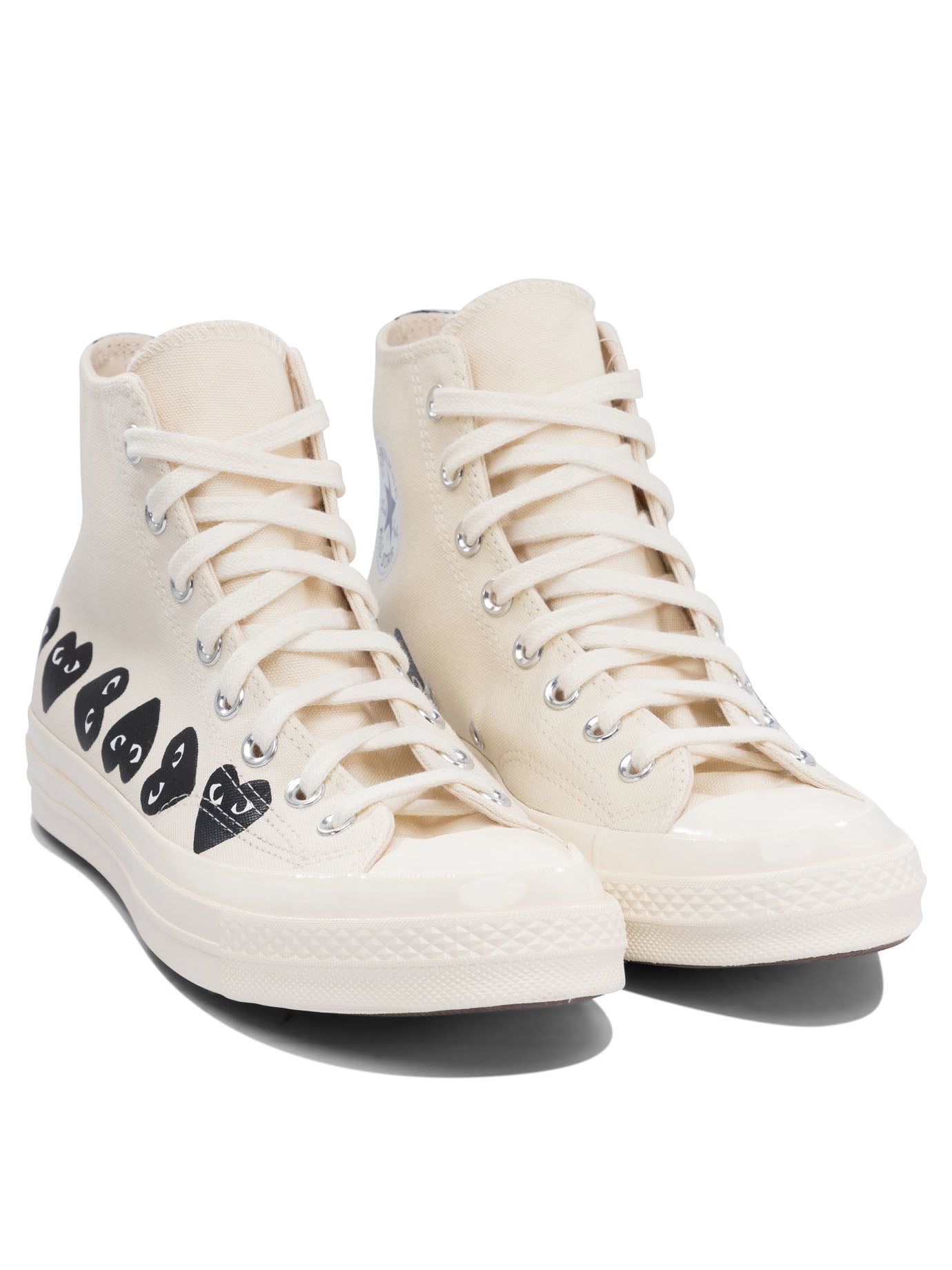 COMME DES GARÇONS PLAY Fashion-Forward Slip-On Sneakers for Men - FW24 Collection