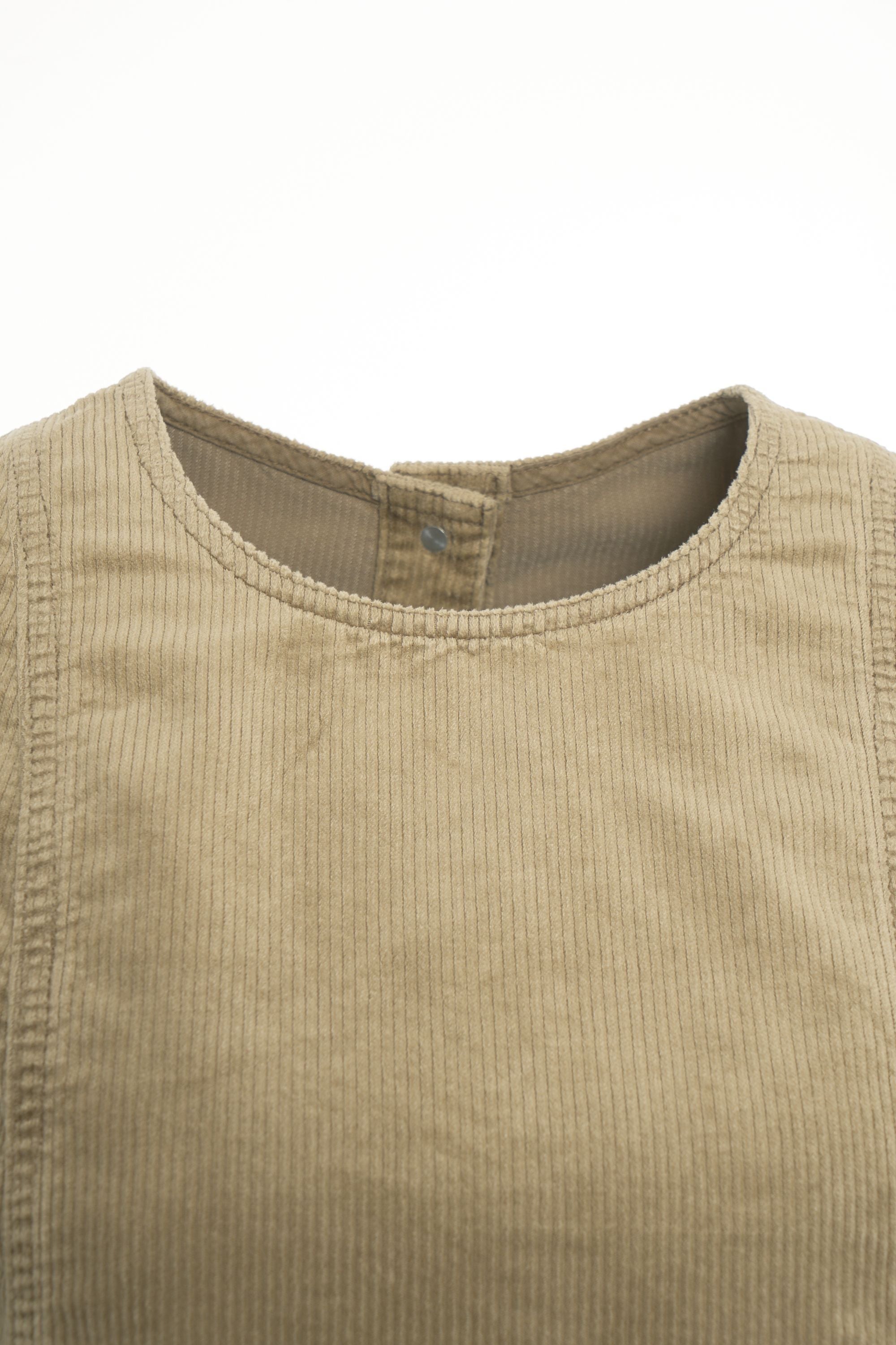 BAUM UND PFERDGARTEN Ribbed Sleeveless Top with Ruffled Hem